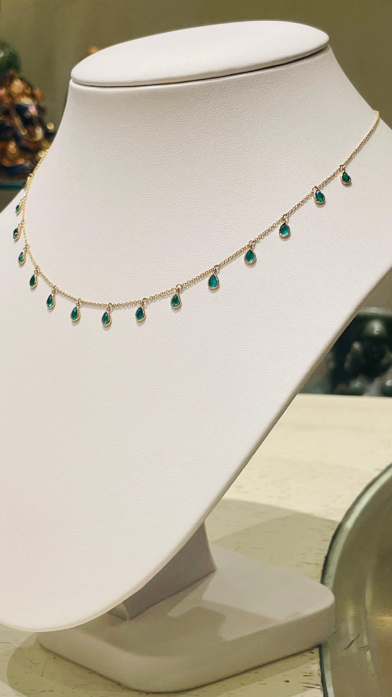 Emerald Necklace in 18K Gold studded with pear cut emerald pieces.
Accessorize your look with this elegant emerald drop necklace. This stunning piece of jewelry instantly elevates a casual look or dressy outfit. Comfortable and easy to wear, it is
