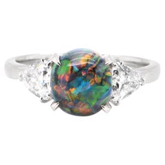 1.97 Carat Lighting Ridge Black Opal & Diamond Three-Stone Ring Set in Platinum