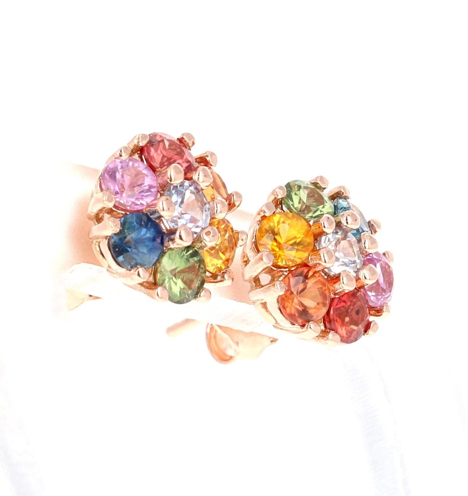 Cute dainty stud earrings that are versatile and great for an everyday look. 

1.97 Carat Round Cut Natural Multicolor Sapphire 14 Karat Rose Gold Stud Earrings.

There are 14 multicolor sapphires set to create a rainbow flower. The total carat