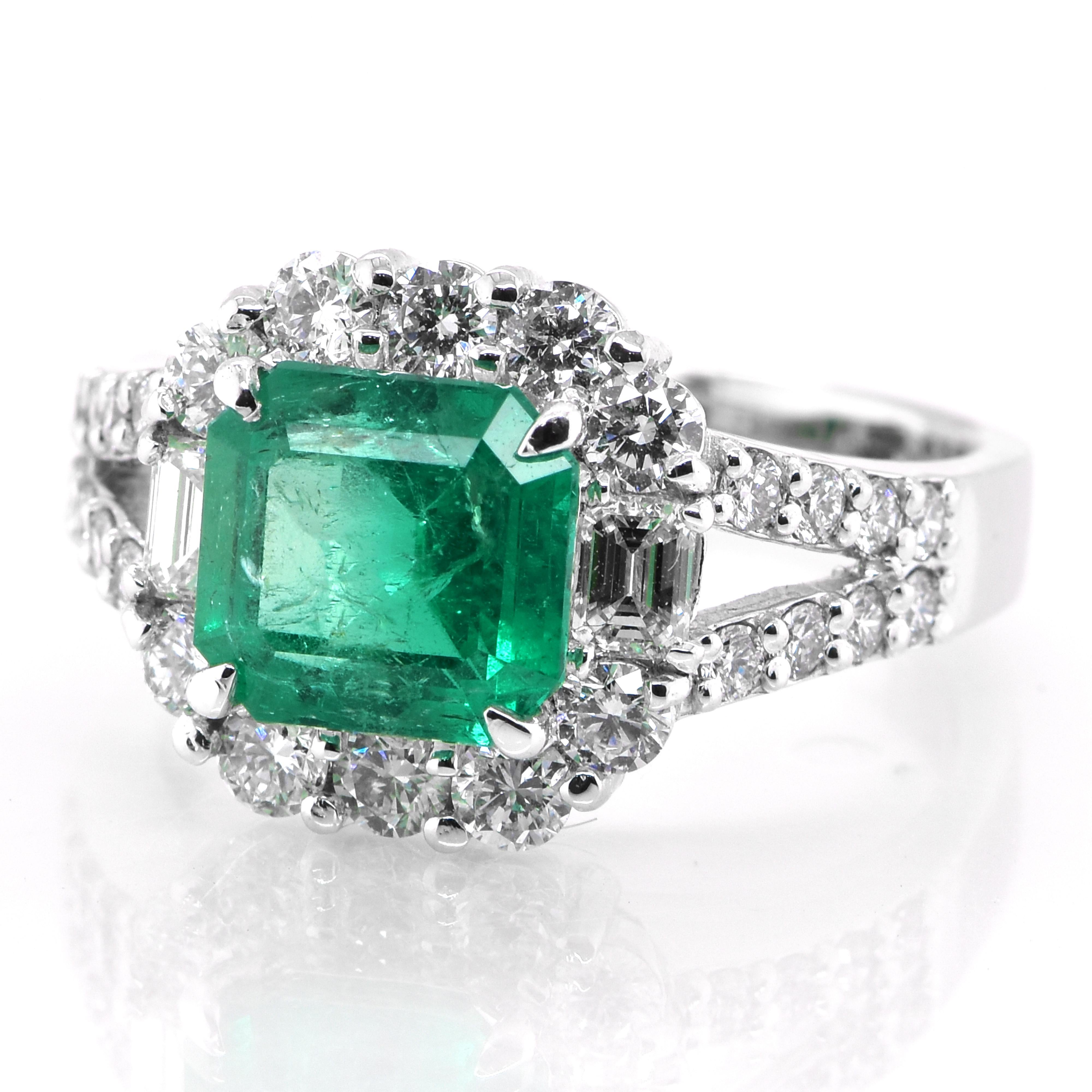 A stunning ring featuring a 1.97 Carat Natural Emerald and 1.10 Carats of Diamond Accents set in Platinum. People have admired emerald’s green for thousands of years. Emeralds have always been associated with the lushest landscapes and the richest