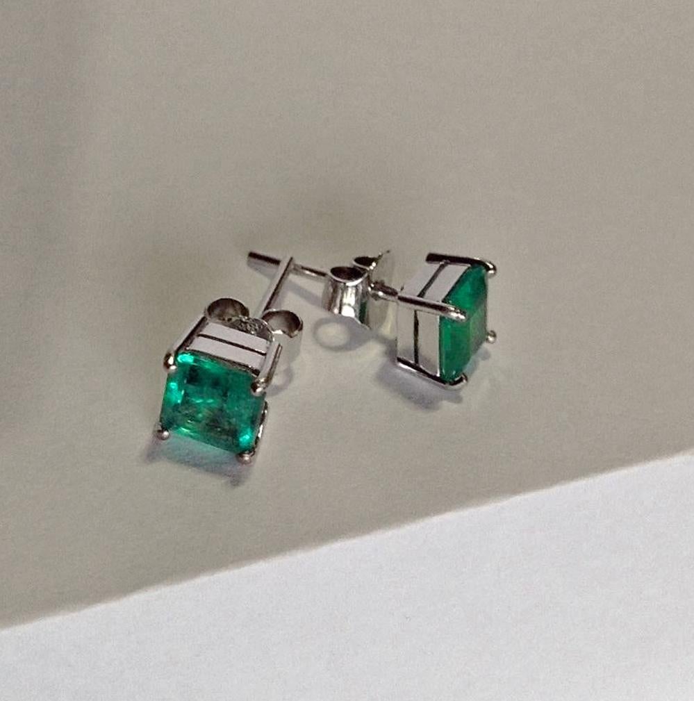 Primary Stones: 100% Natural Colombian Emeralds
Color/Clarity : AAAA+ EXTRA FINE Medium Green Color/ Clarity, VS
Total Gemstones Weight:  1.97 carats
Shape or Cut : Emerald Cut
Earrings Measurement: 7.25mm x 6.90mm
Total Earrings Weight: