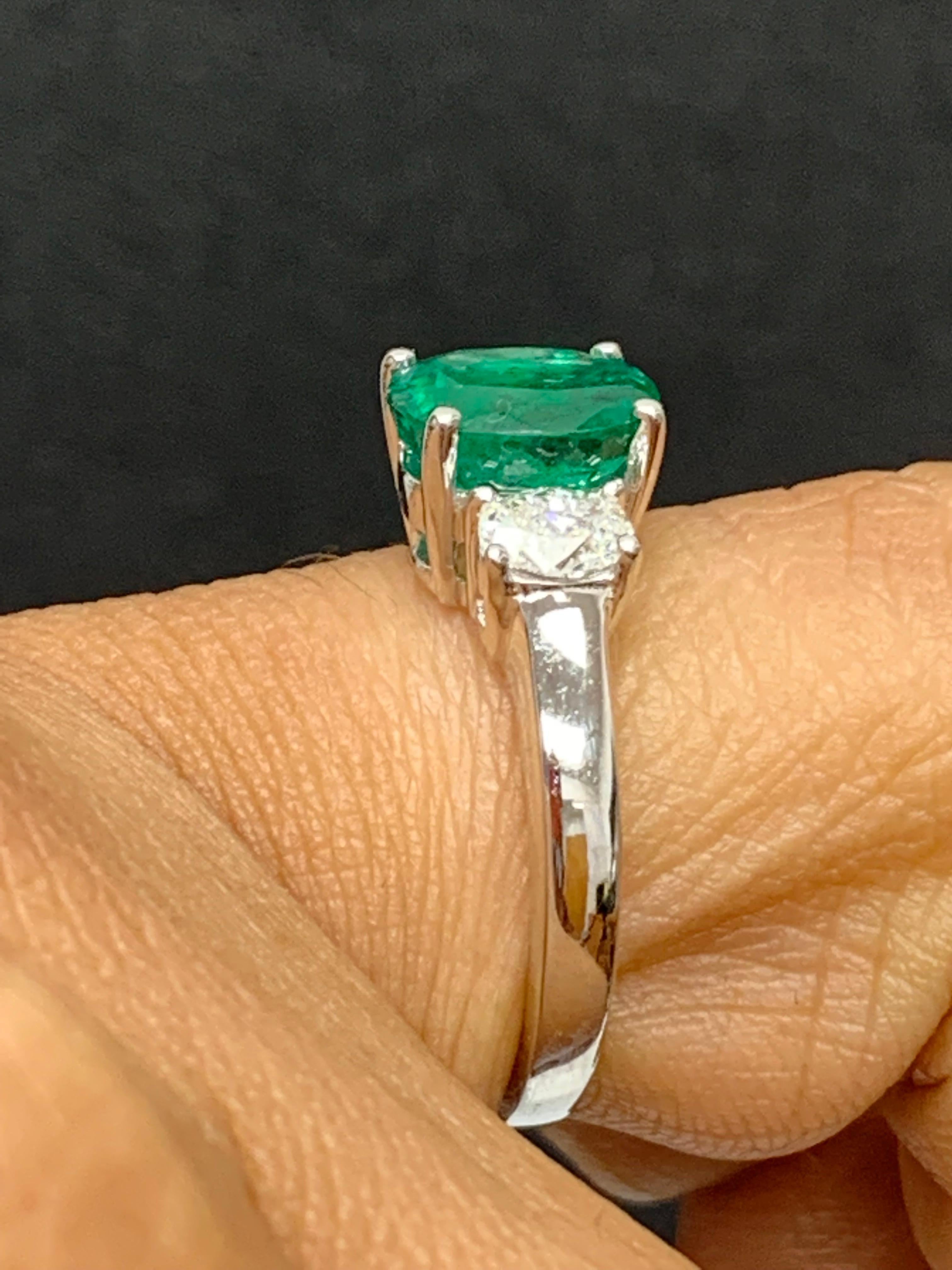 Modern 1.97 Carat Oval Cut Emerald & Diamond 3 Stone Engagement Ring in 18k White Gold For Sale