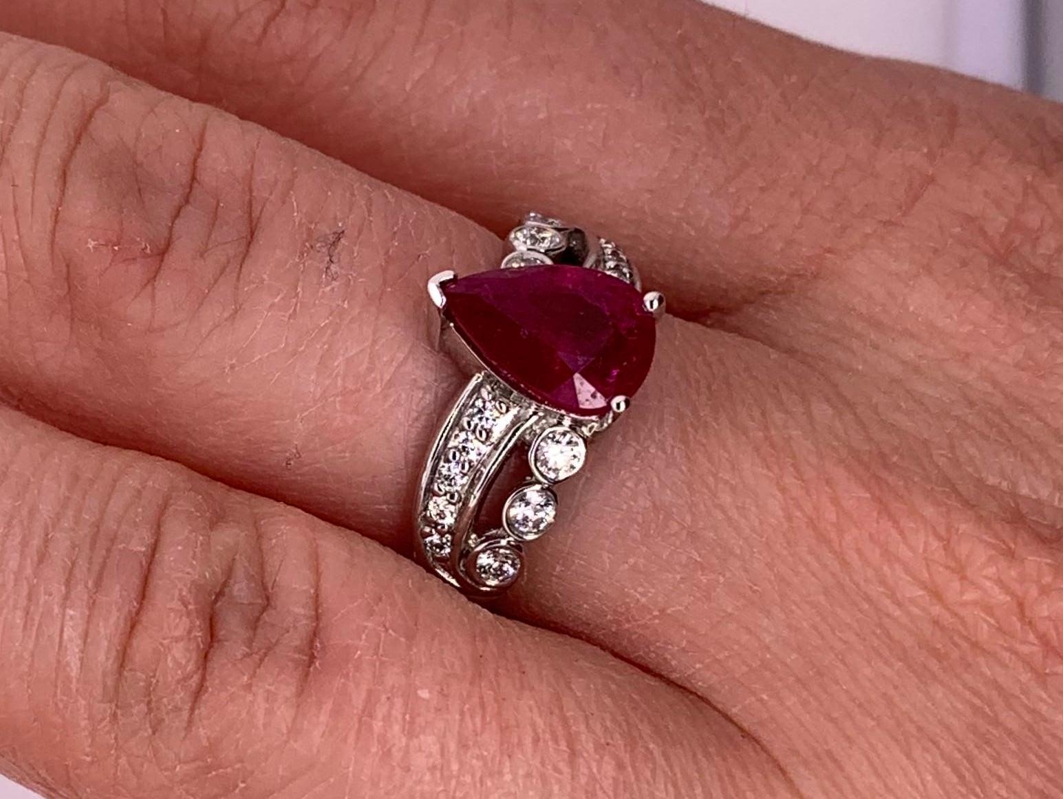 Pear Cut 1.97 Carat Ruby Engagement Ring with Swirl Diamond Fashion Band For Sale