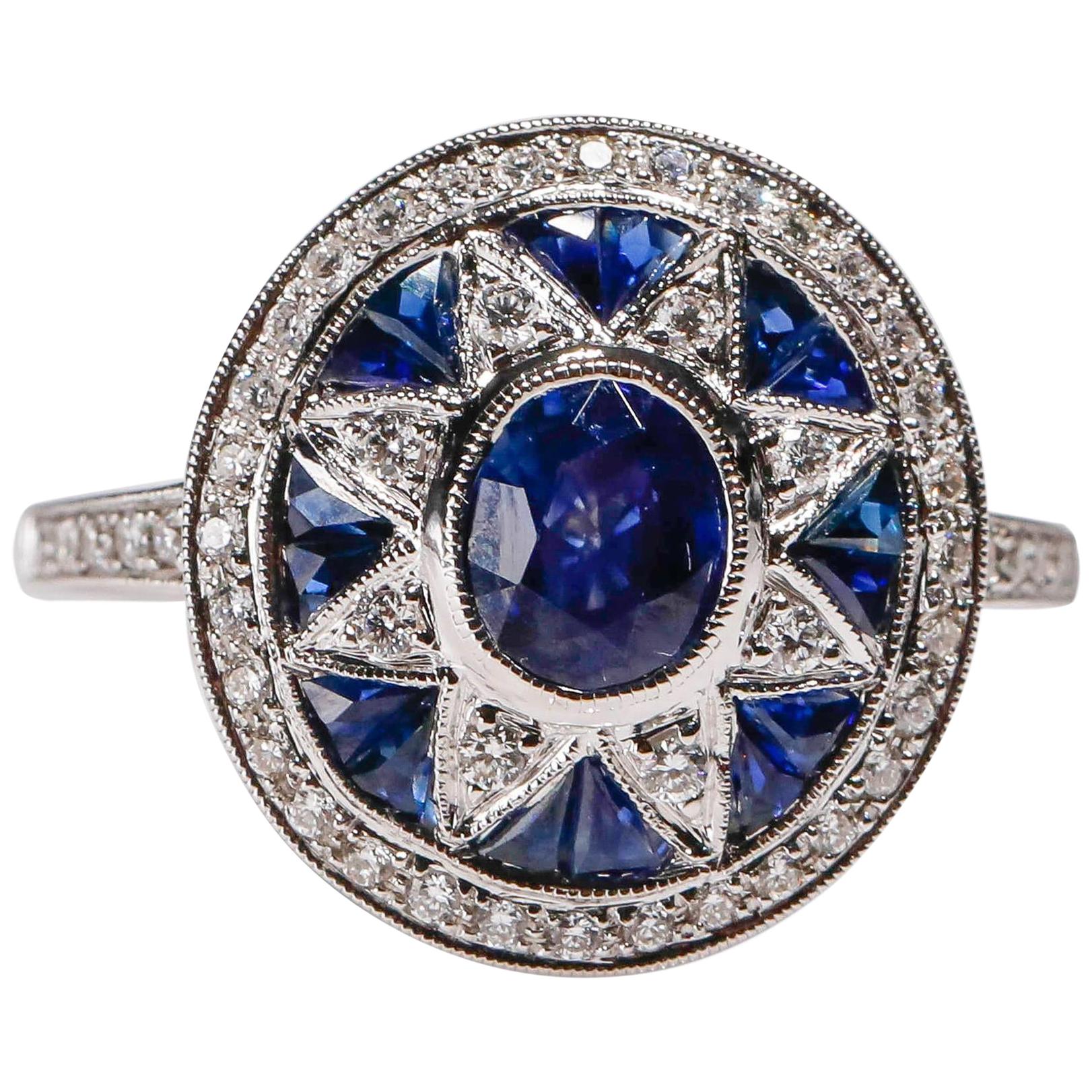 Art Deco Inspired New 1.97 Carat Sapphire 0.32 Carat Diamond 18K White Gold Ring

This ring is brand new. It has been created to look like an elegant ring from the Art Deco Era.
The Diamond is Natural. It is a Round Brilliant Cut.

This stunning