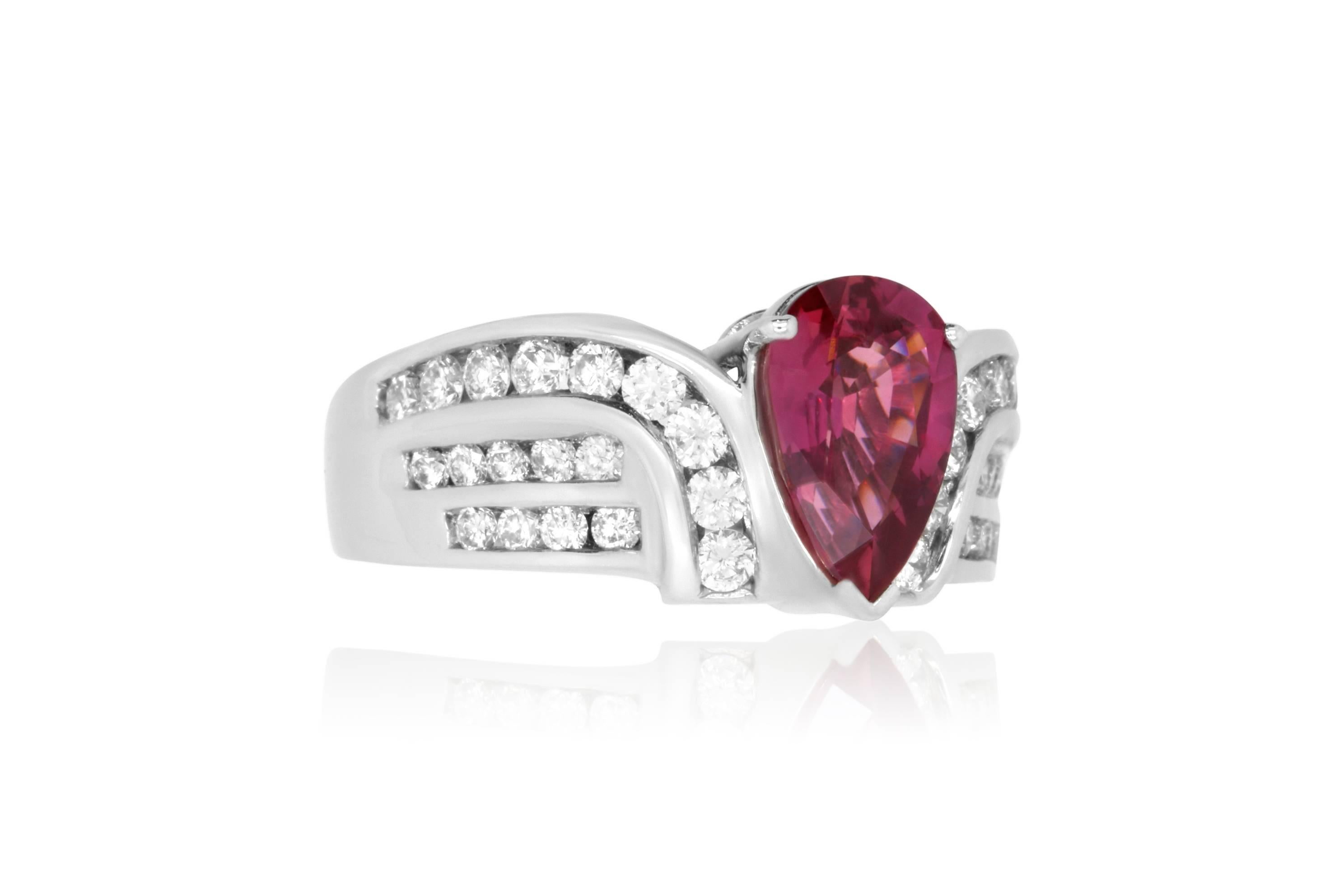 An extremely unique colored Pink Ruby

Material: 14k White Gold
Gemstones: 1.97 Pear Shaped Ruby
Diamonds: Brilliant Round White Diamonds at 0.90 Carats. SI Clarity / H-I Color. 
Ring Size: 6.75. Alberto offers complimentary sizing on all