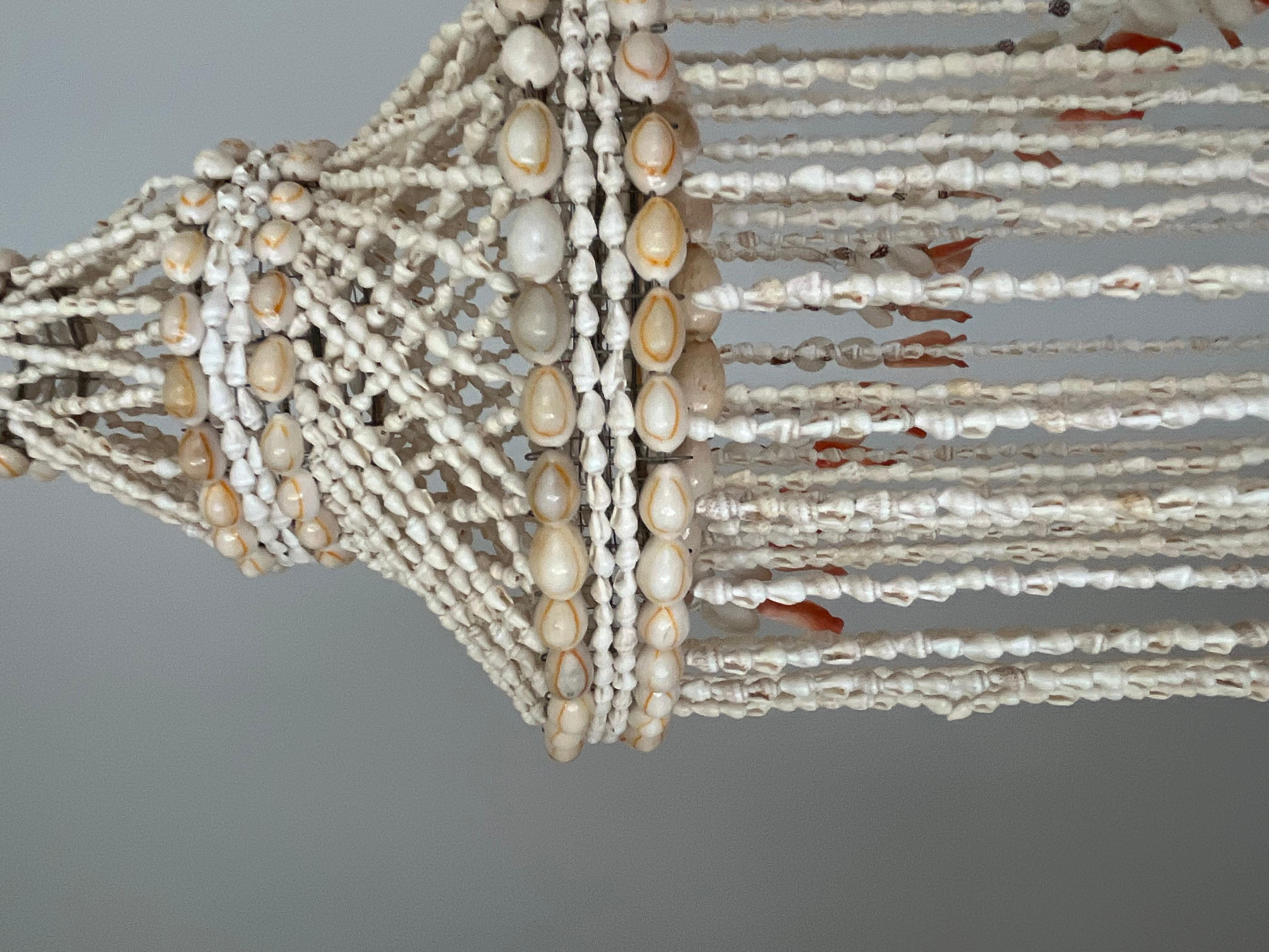 Shell 1970/1980s tall chandelier in strings of natural shells For Sale