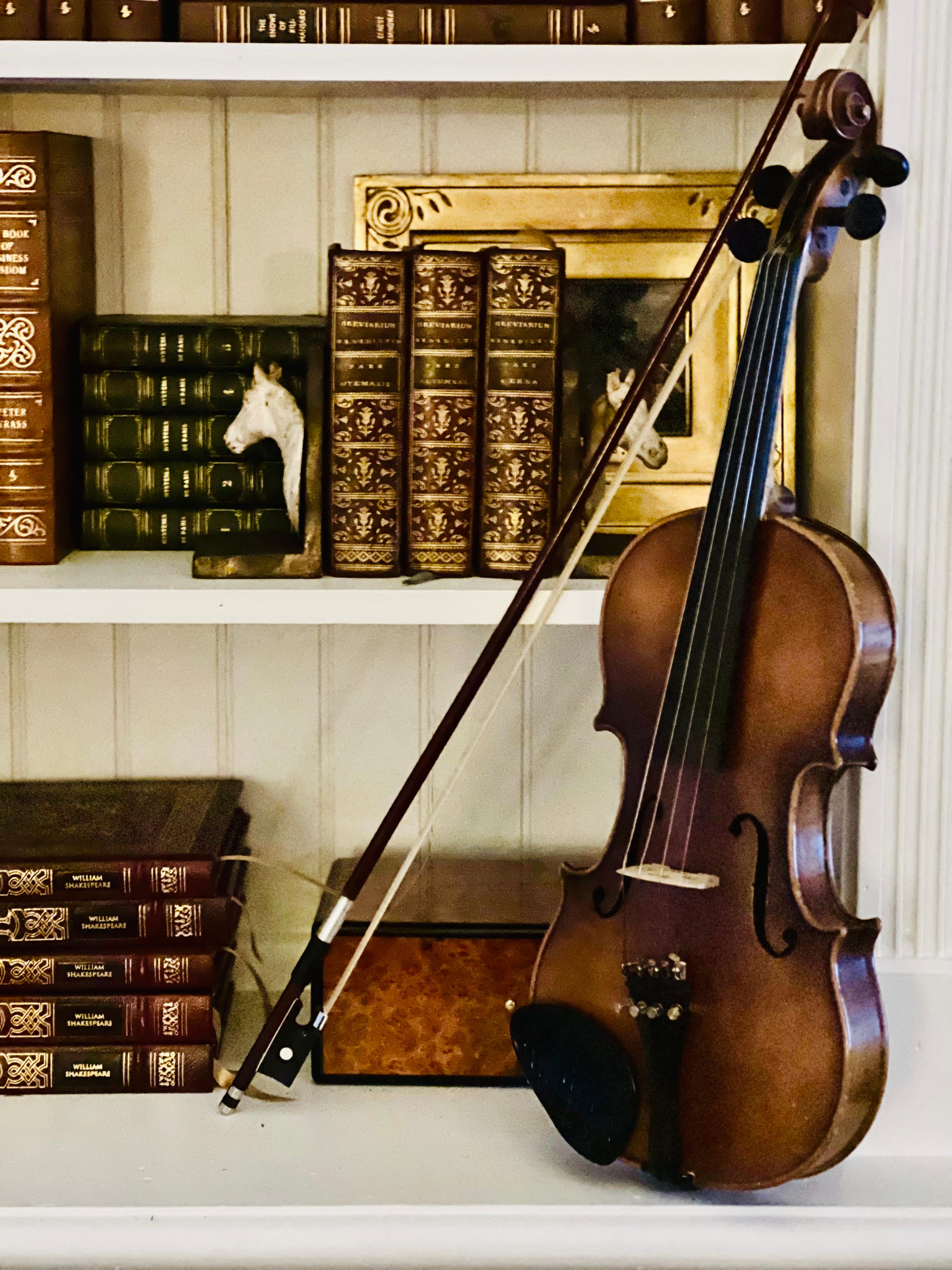 E.R. Pfretzschner 3/4 hand-crafted copy of Antonius Stradivarius violin, made in Germany, 1970. Elegant, rich wood grain and fine craftsmanship showcase the beauty of this violin. It is in good playing condition and comes with case and Eco bow.