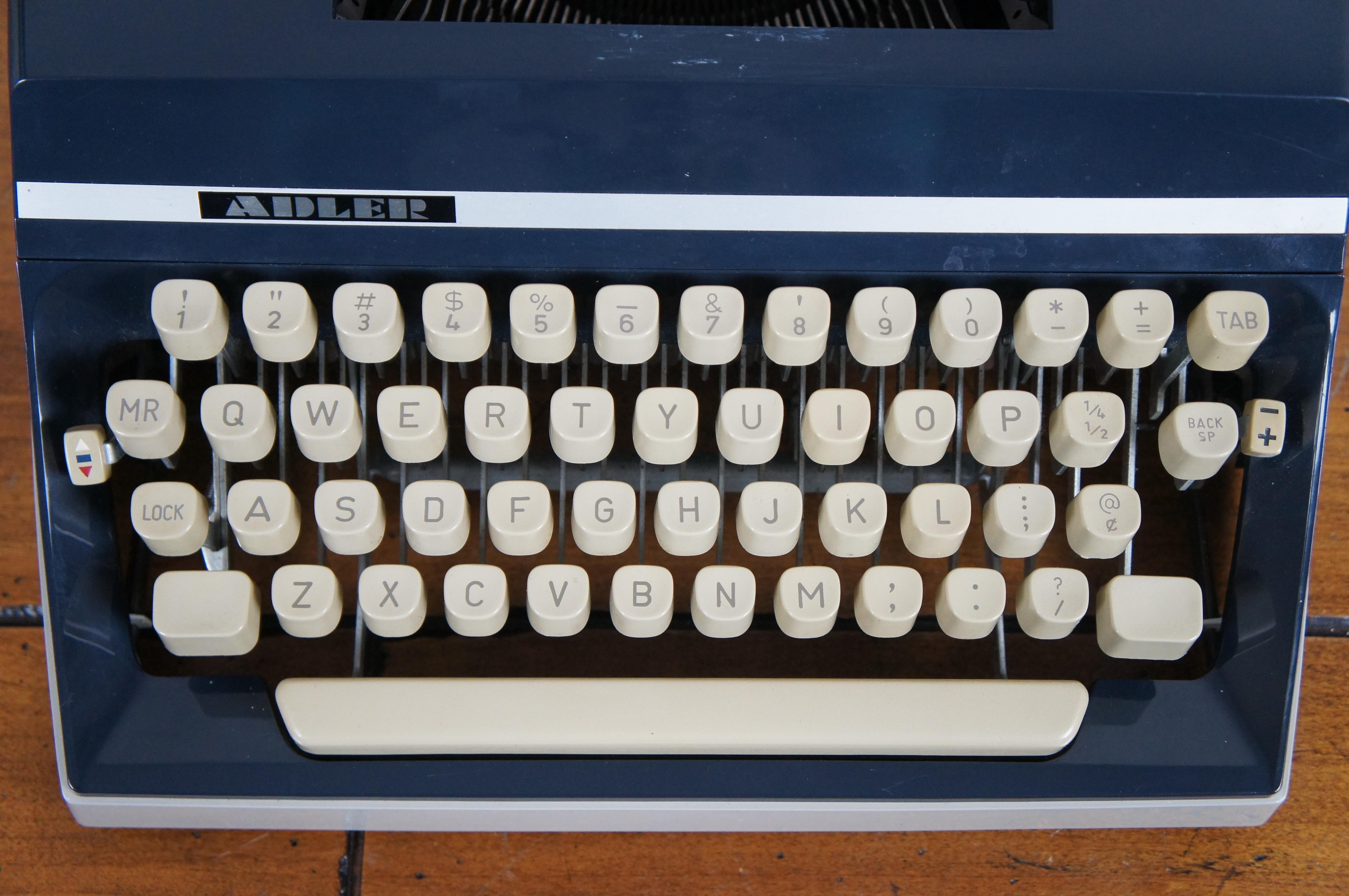 Mid-Century Modern 1970 Adler German J5 Navy Blue Gray Mechanical Portable Typewriter & Case For Sale