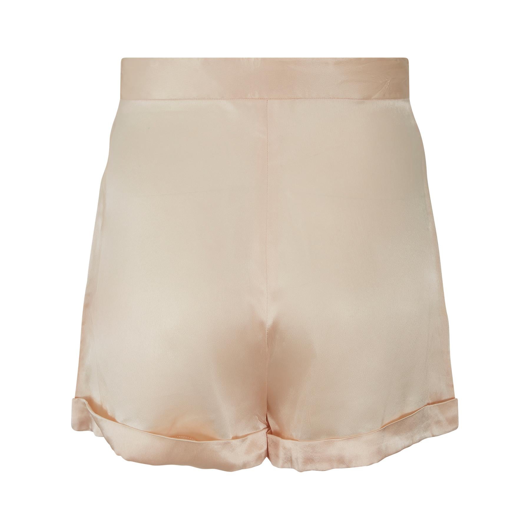 These original early 1970s shorts are a great example of what the famous London boutique Quorum did best - sexy loungewear. The sleek high waisted look is based on earlier 1930s tap pants. Ossie Clark, the most famous of the Quorum designers, based