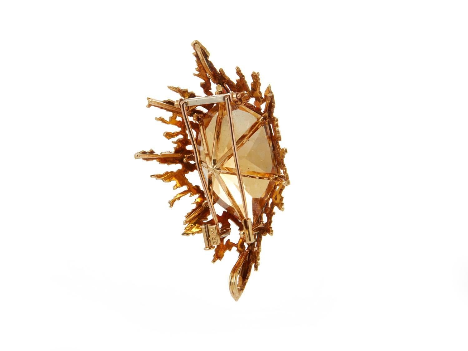Andrew Grima Untitled Topaz & Diamond Pendant Brooch, 1970, marked CS, HJCo, London, 18k hallmarks for 1970, 750 and GRIMA (on reverse). 18k gold pendant/ brooch set with a Brazilian topaz and diamonds, unique. 

Andrew Grima (1921-2007) was born in