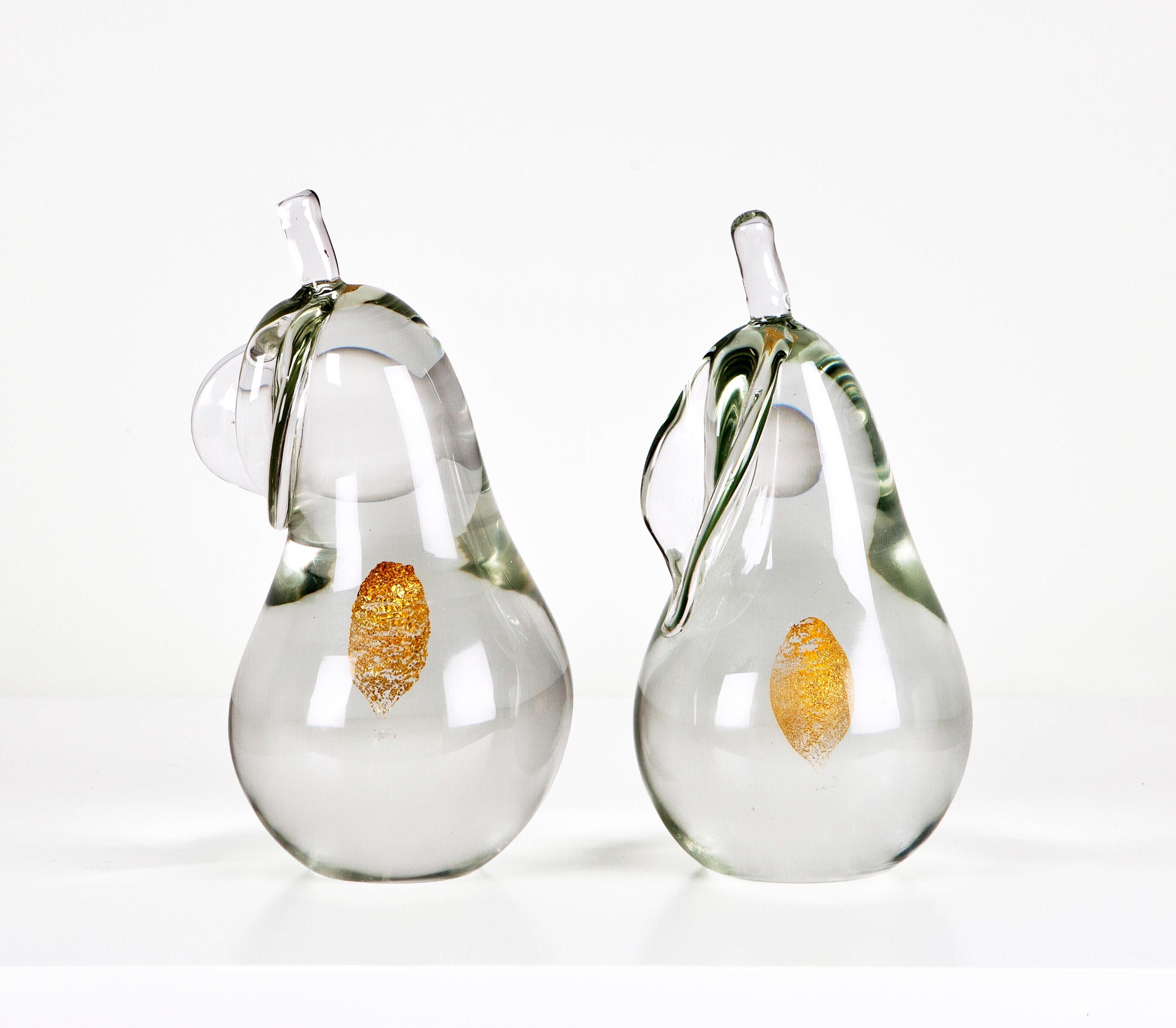 Pair of crystal pears and gold dust by Antonio da Ros.

Pair of glass pears and gold dust by Antonio da Ros for Cenedese Murano. Italy, 70s.
Excellent condition used with slight traces of age and use
Dimensions:
H 7.48 in.
