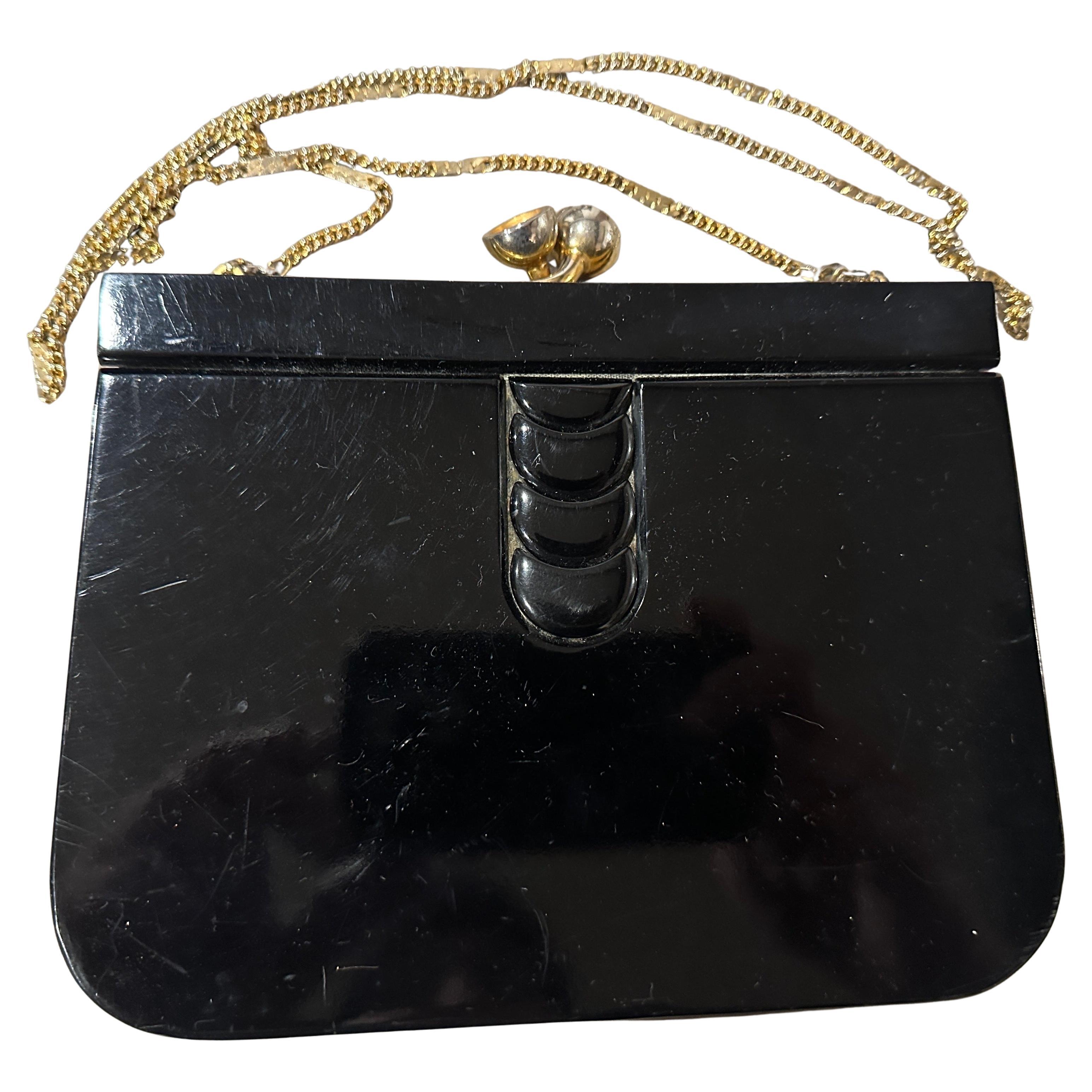 Bolso italiano de baquelita negra y latón dorado estilo Art Déco de 1970