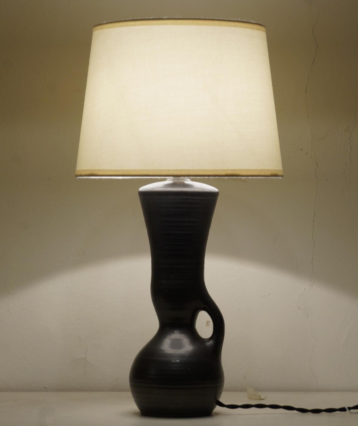 Black satin ceramic table lamp, custom made fabric lampshade, rewired with twisted silk cord.

Measure: Ceramic body height 25 cm - 9.9 in.
Height with lampshade 41 cm - 16.1 in.

