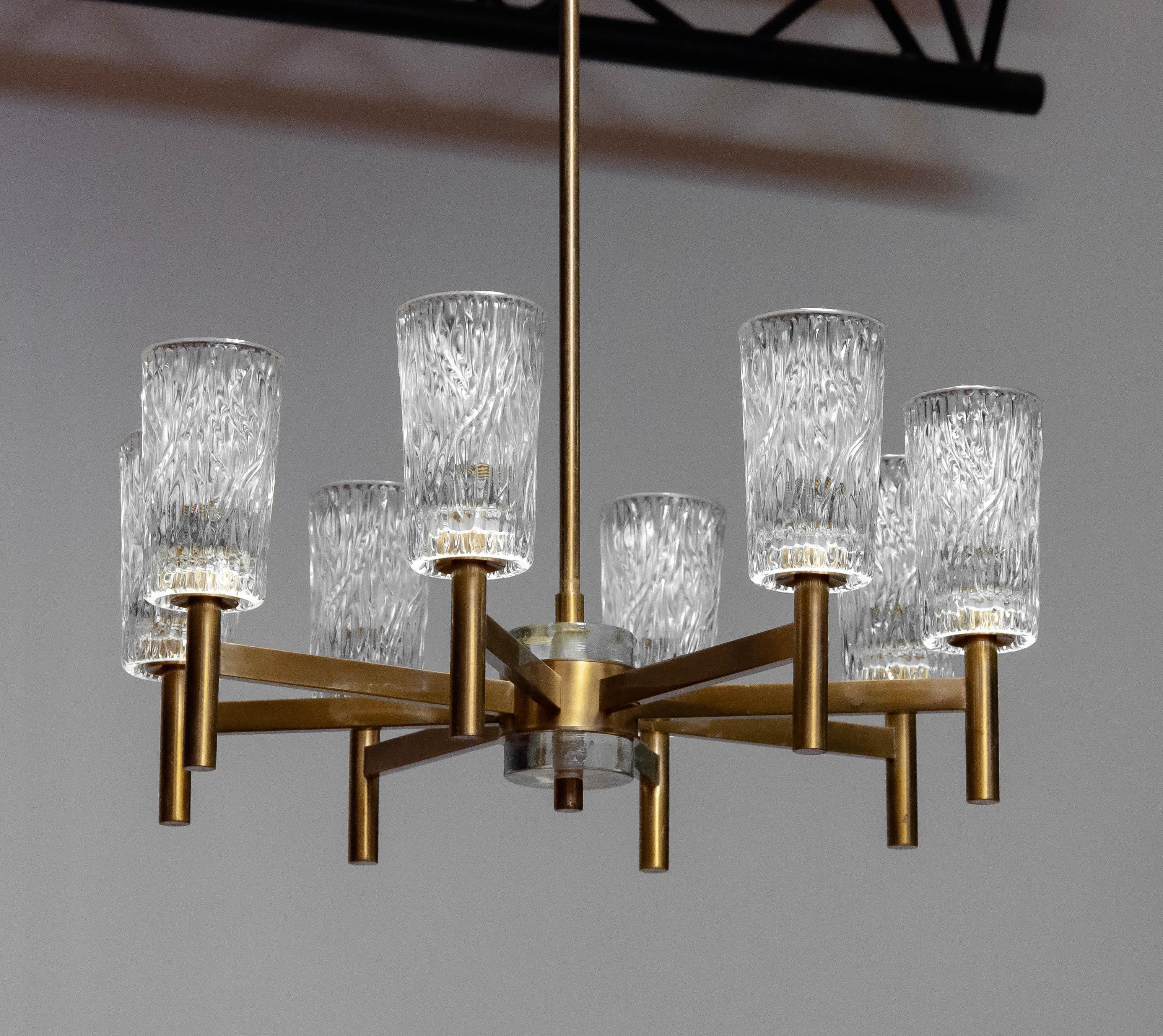 1970 Brass Eight Arms Chandelier With Clear Art Glass Vases By Markaryd Sweden For Sale 1