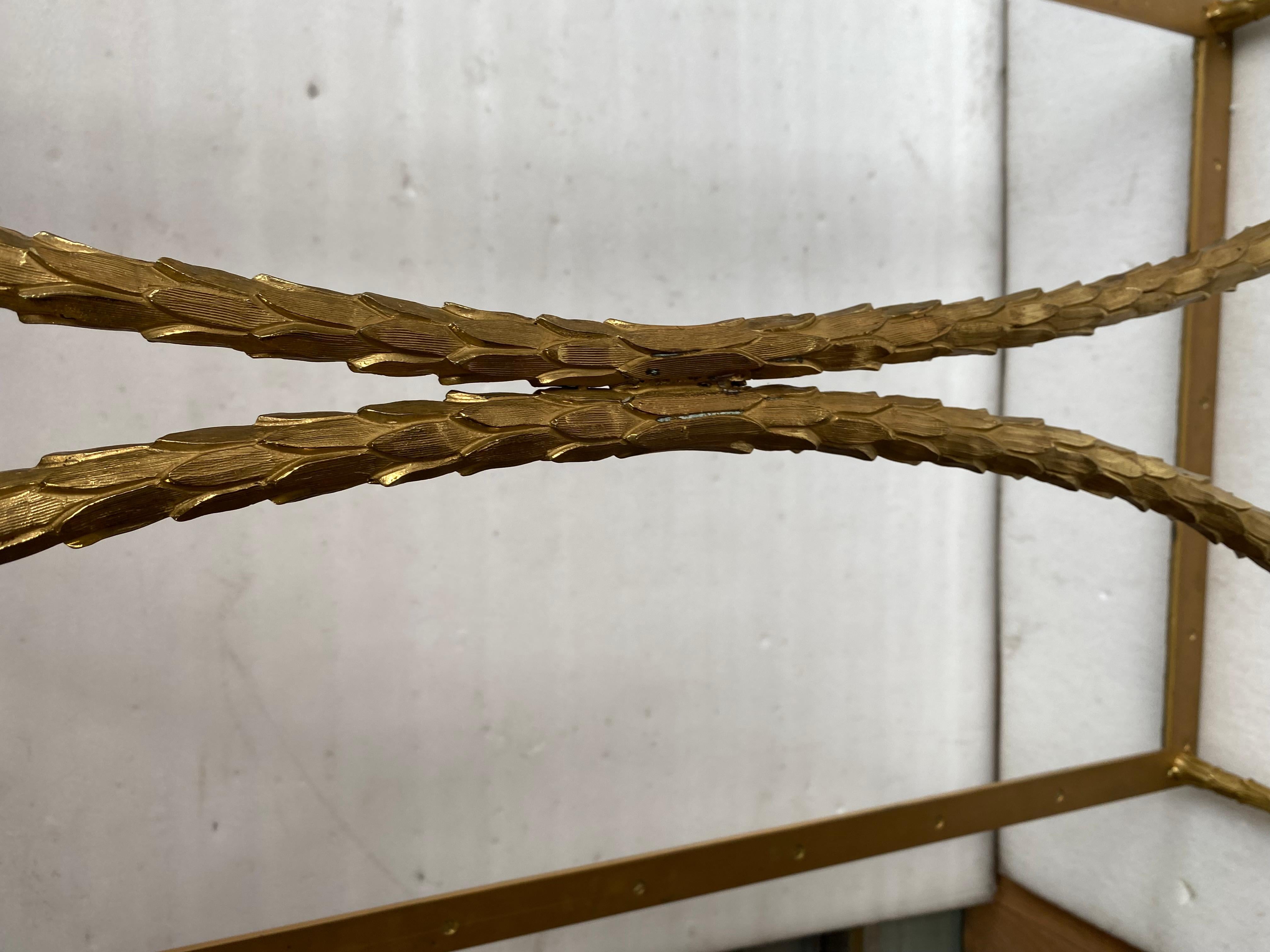 1970′ Mesa de centro de bronce Modelo palmera, Maison Charles Firmado, 52 x 26 x A 17 Francés en venta