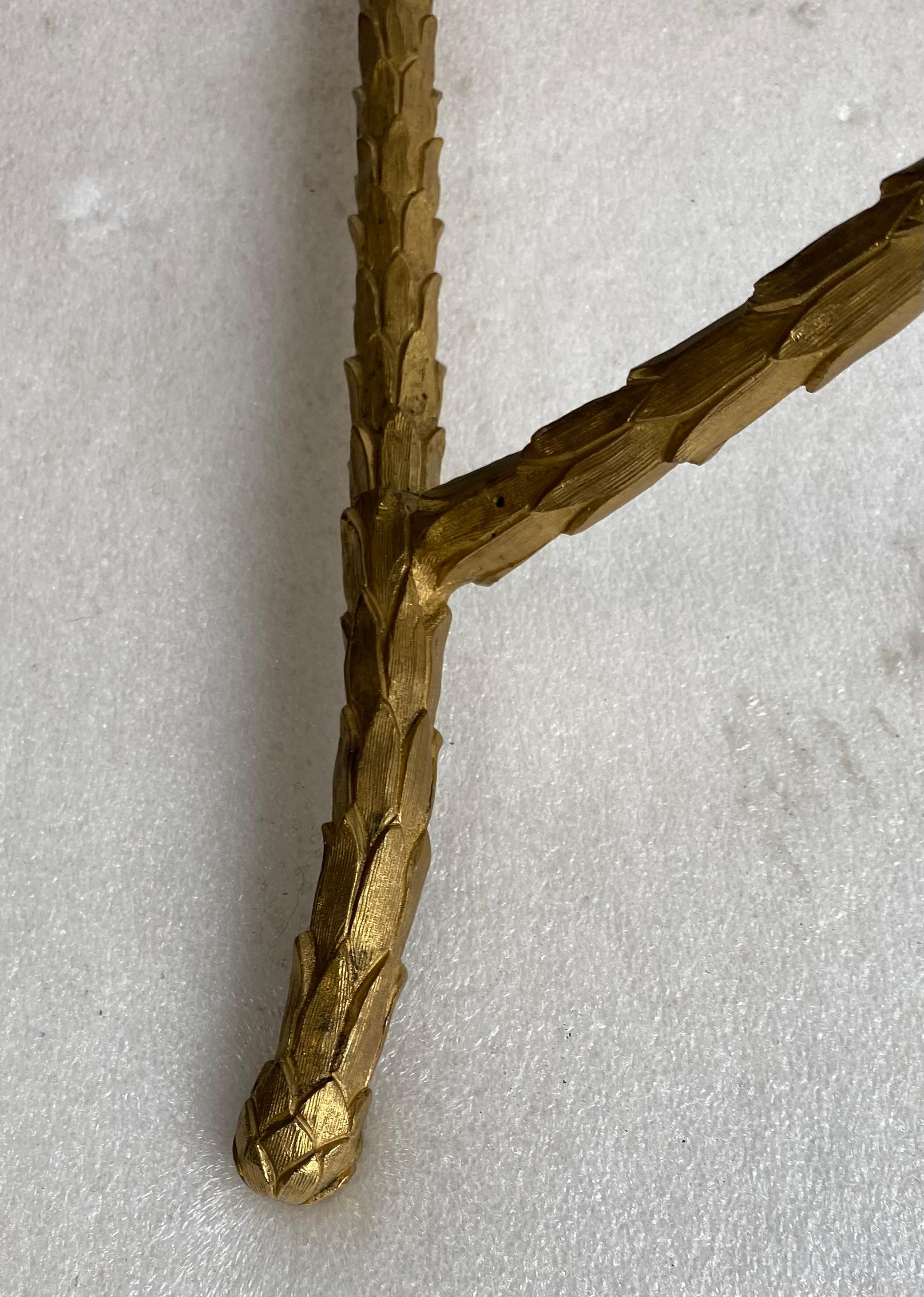 1970′ Mesa de centro de bronce Modelo palmera, Maison Charles Firmado, 52 x 26 x A 17 Dorado en venta