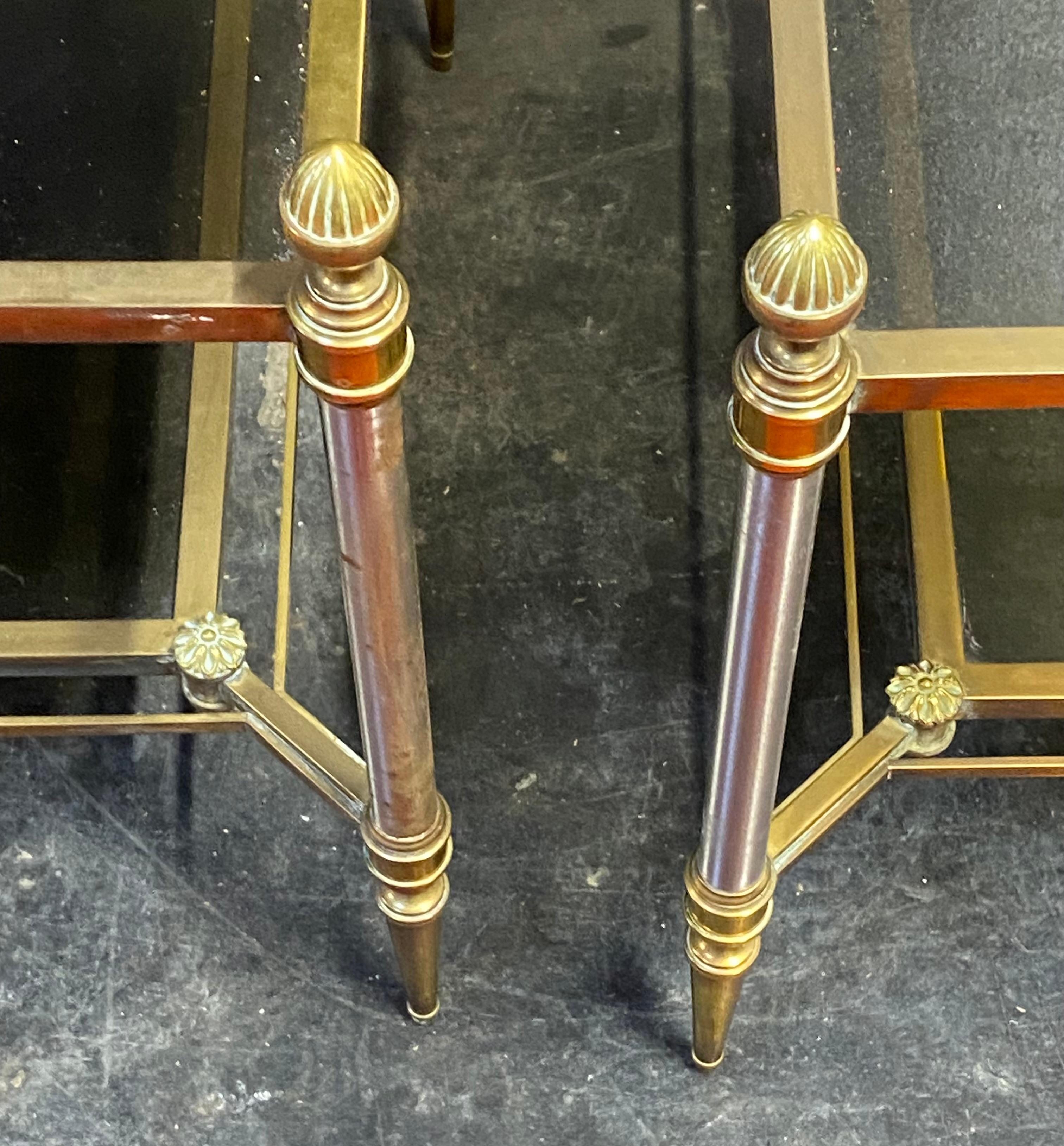 Coffee table with smoked glass shelves, uprights ending in bronze tassels and barrels with gunmetal patina cases typical of this brand
condition of use circa 1960/70
Length: 103 cm
Width: 54 cm
Height: 49 cm
Pair of end tables
Length: 63 cm
Width: