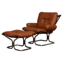 chaise longue et pouf en cuir cognac et chrome 1970 par Harald Relling