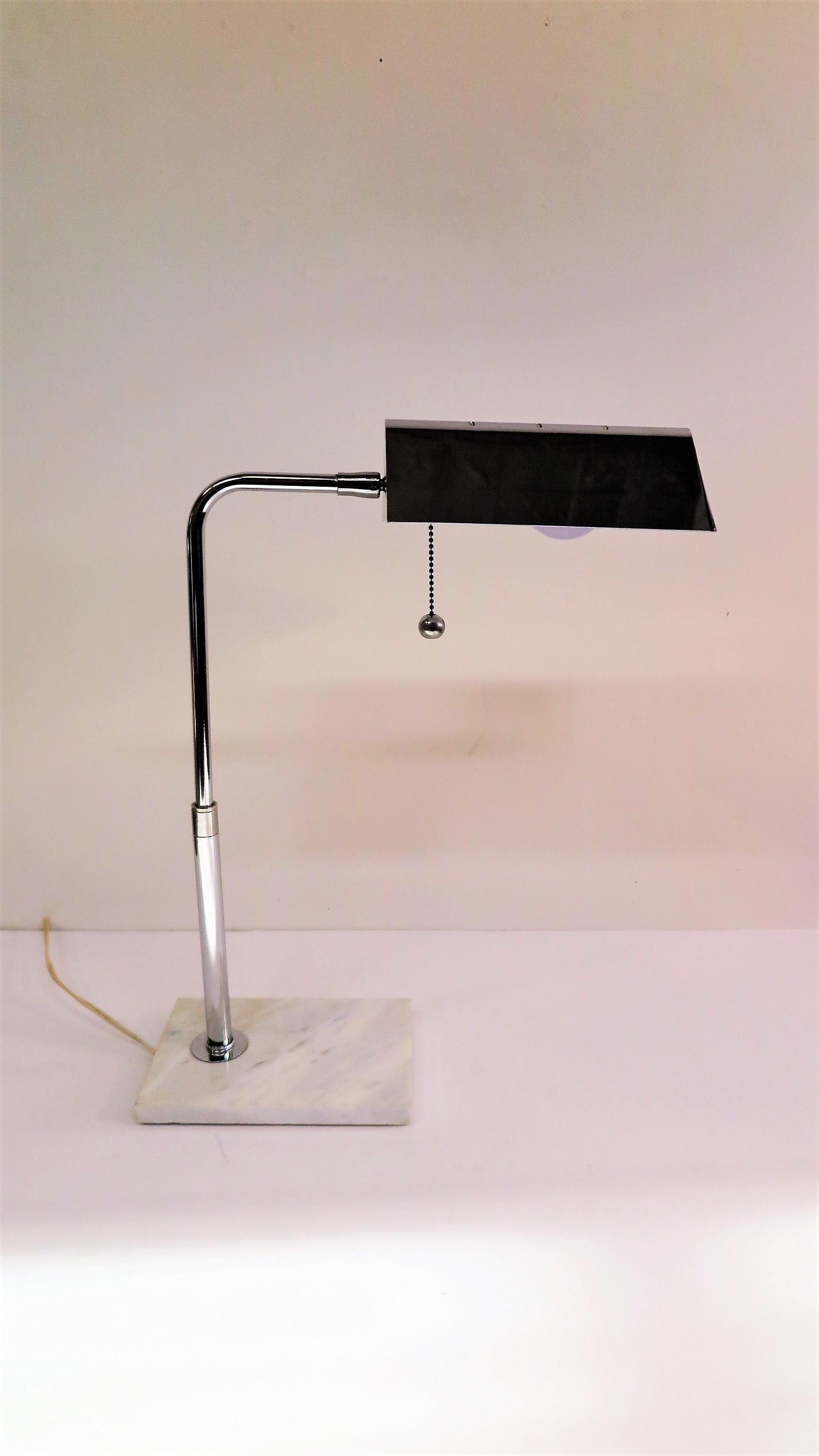 Marble and chrome desk lamp. Can swivel 180, and has some ability to angle to the 90 degrees or about. Very good condition 1970.