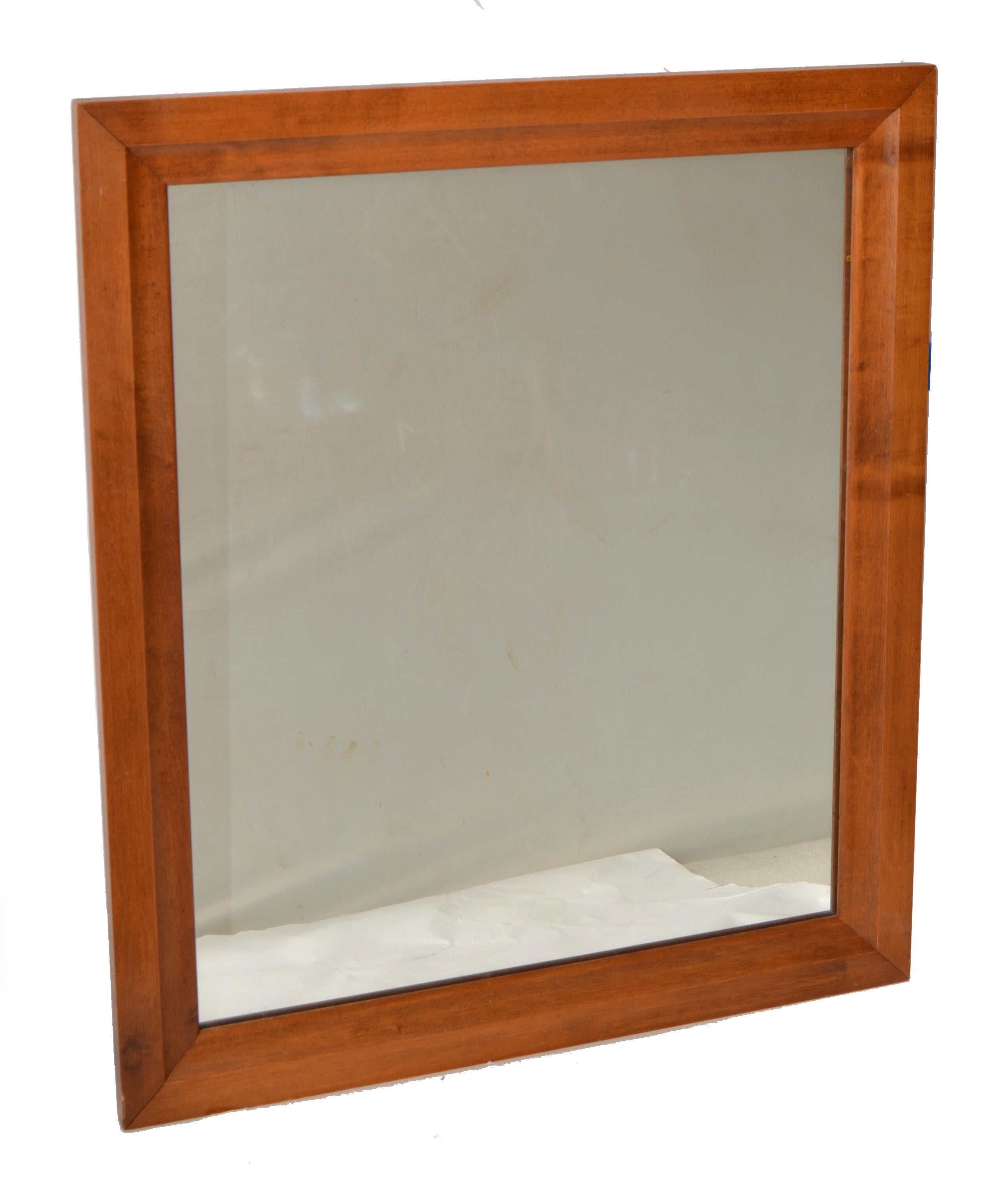 Traditional Early American Maple Wood Wall Mirror made by Vintage Moosehead Furniture.
Moosehead is known for heavy Maple and New England Birch furniture since 1960.
This rectangle Wall Mirror is great quality and quite heavy.
Secure hanging wire on