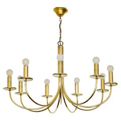 1970 Elegant gilded brass chandelier by Maison Roche.