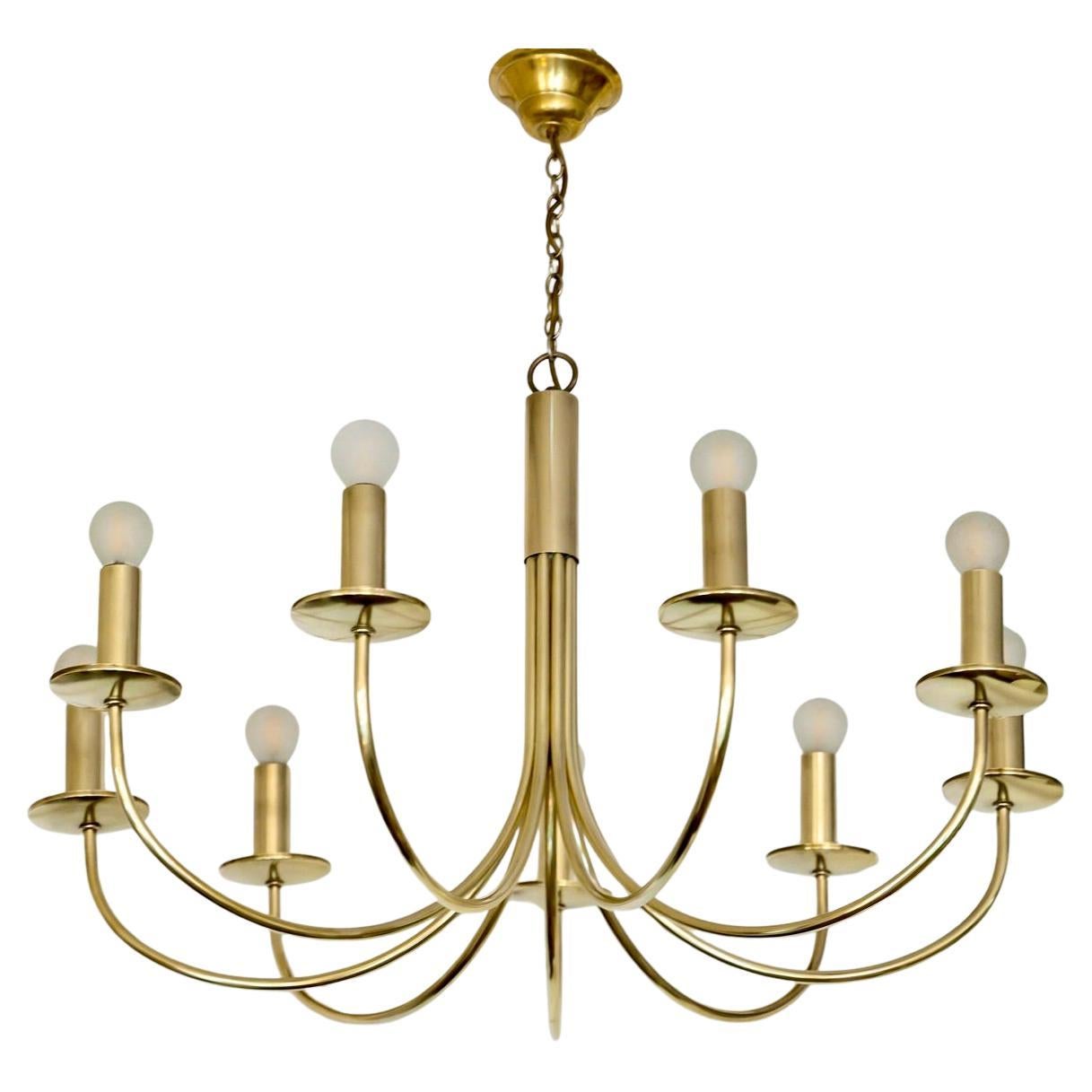 1970 Elegant gilded brass chandelier by Maison Roche.