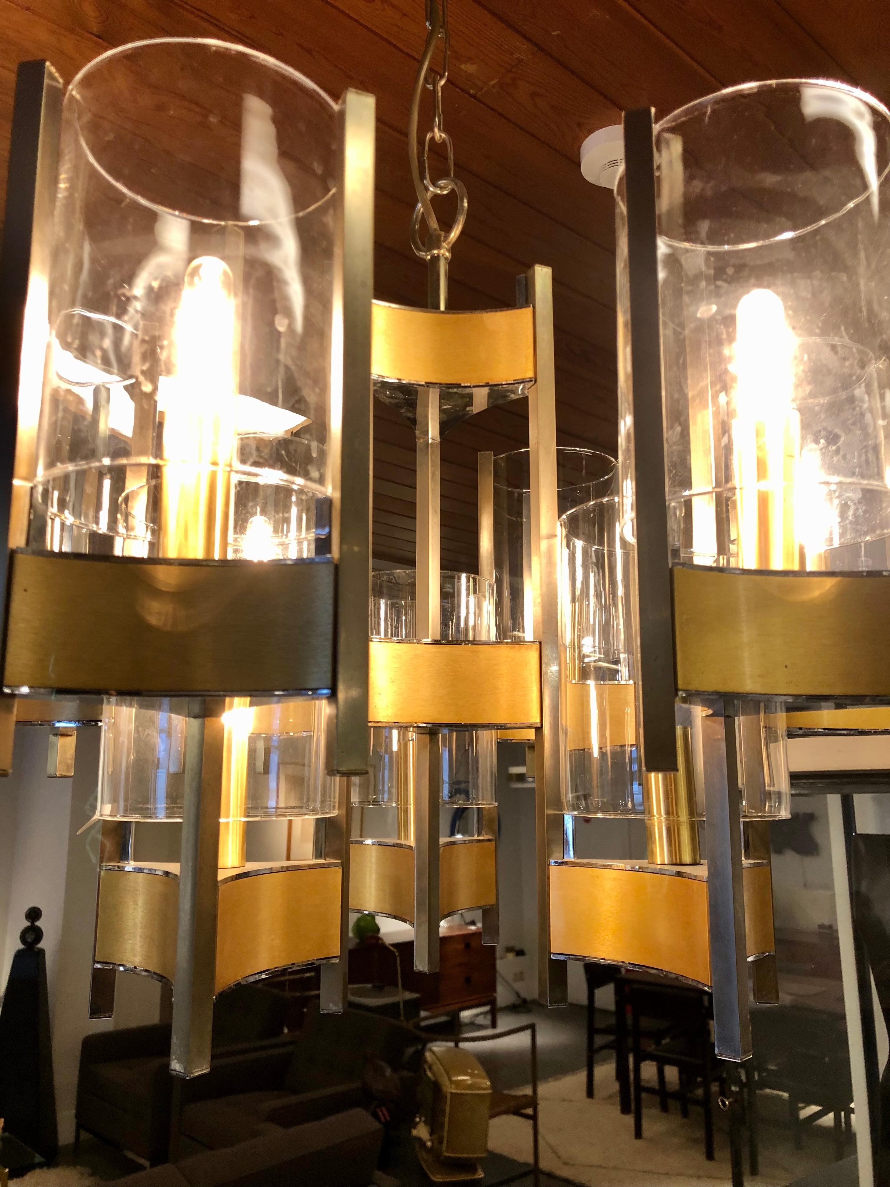 Italian chandelier designed by Gaetano Sciolari 
9 electric bulbs made in the seventies.