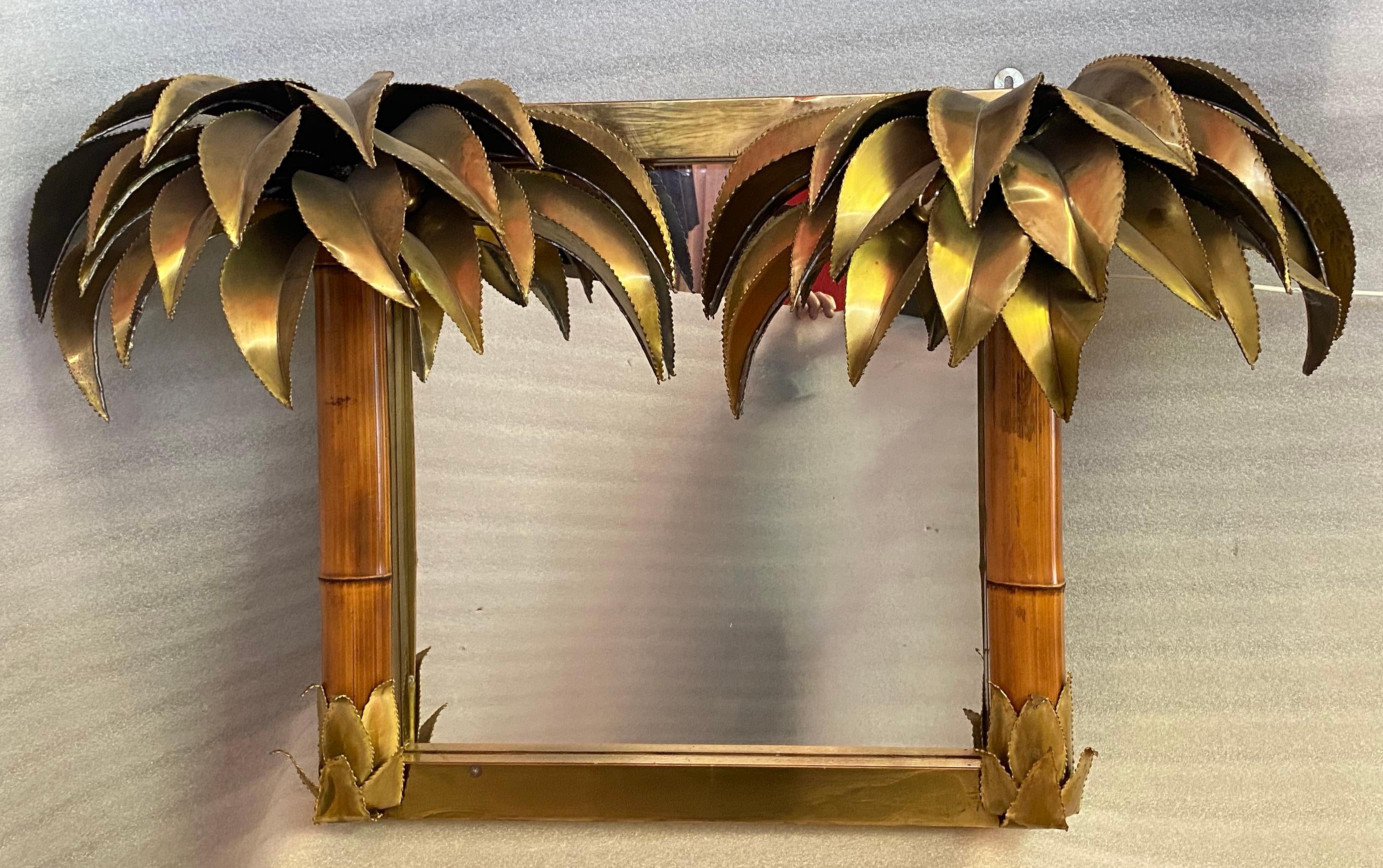 1970' Illuminating Palm and Bamboo Tree Mirror in Brass Unique and Original Piece By Barbier, Jansen, Fernandez, Faure, 120 x 29 x H 65 cm 
Mirror in gilded brass and bamboo, adorned with 2 illuminating palm trees French work of Barbier, supplier