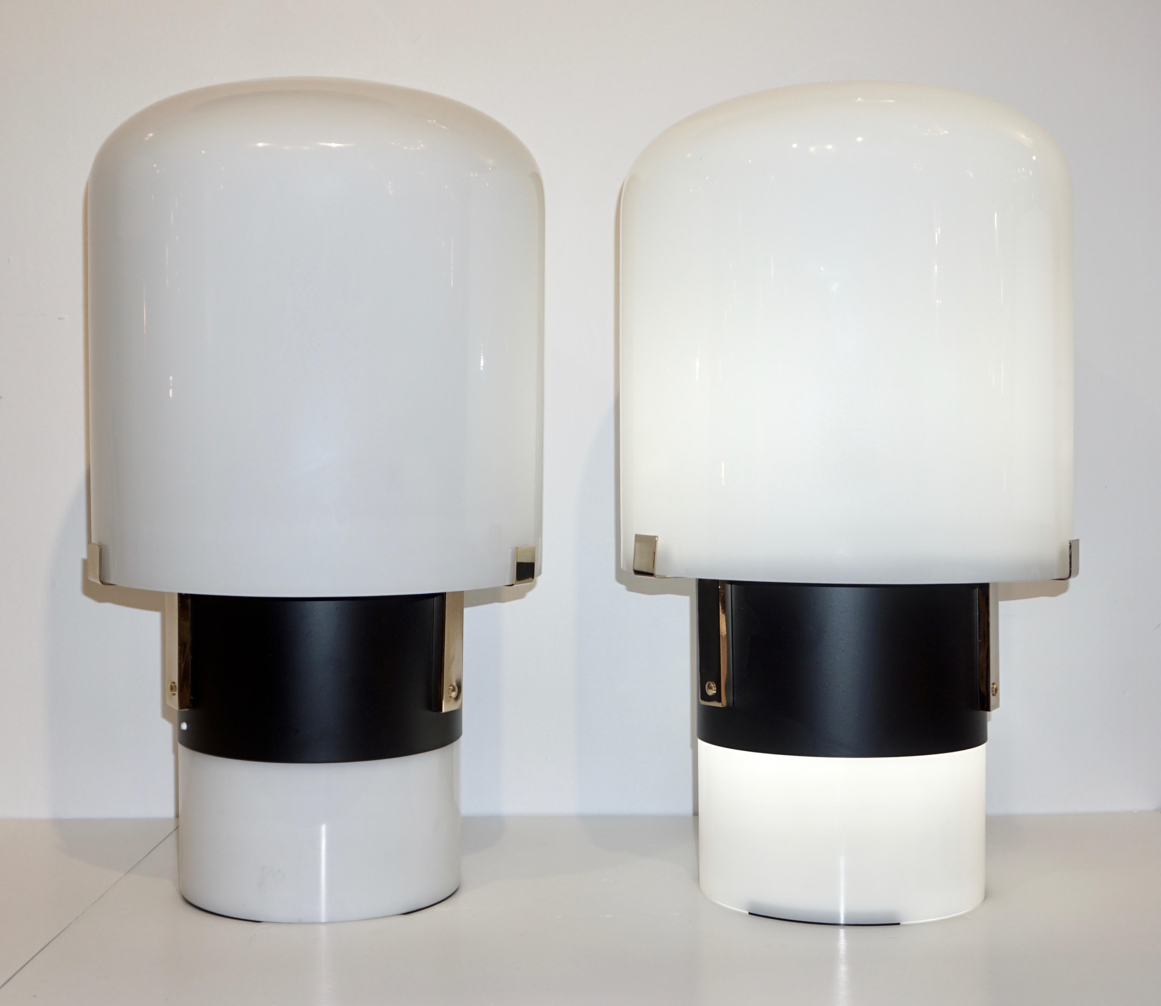 Italian architectural Pair of tall mushroom table lamps or floor lamps of urban modern design by LOM, a lighting company in Monza (near Milan), closed in the 1990s, distinguished by the use of excellent materials and effective simple Design. The