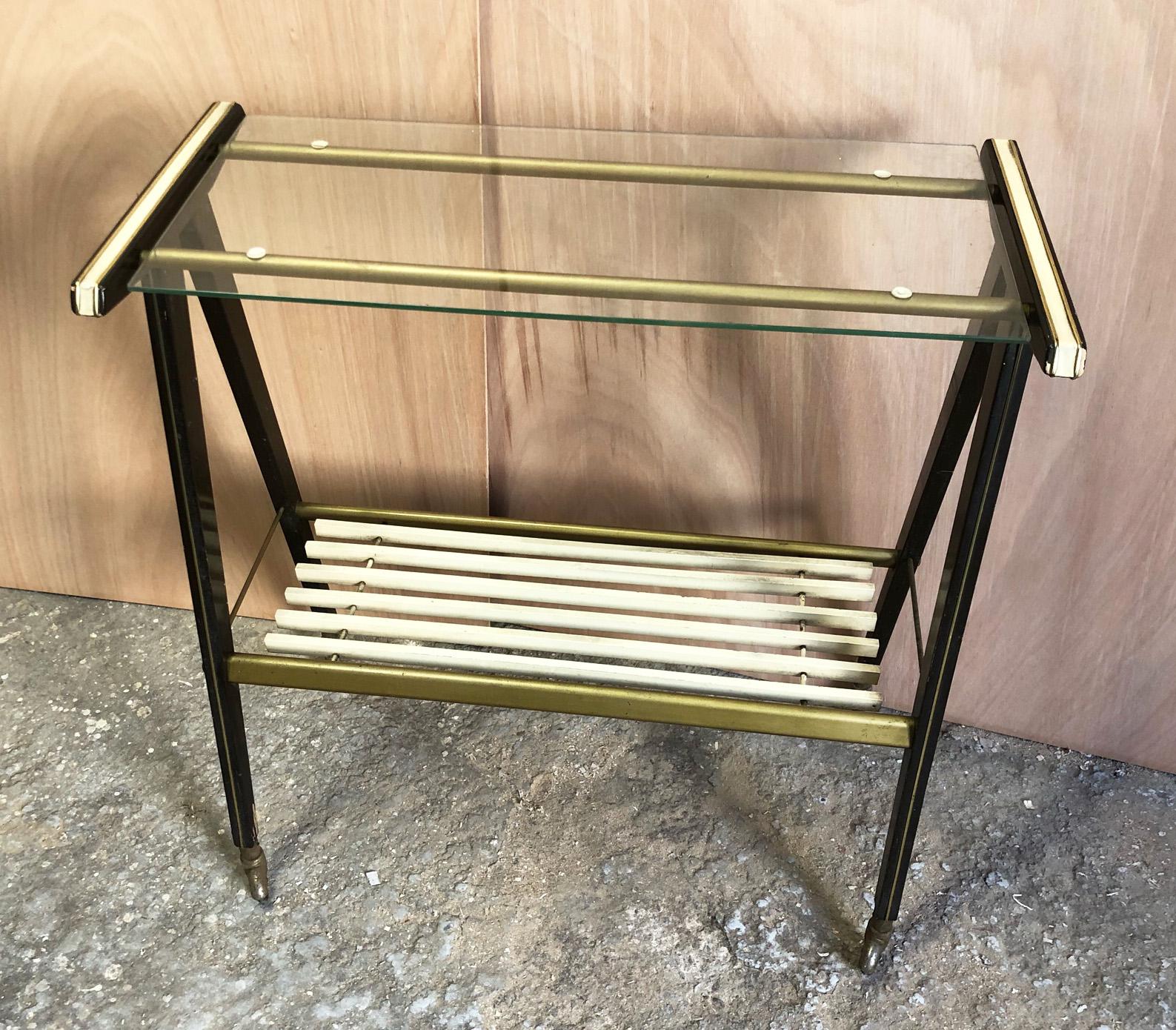1970 Italian trolley in gold and beech colored aluminum with inserts and wheels.
 Transparent glass top.
 Luxury version of the trolley popular in those years.

To find out the cost of transport to USA etc write a message indicating the delivery