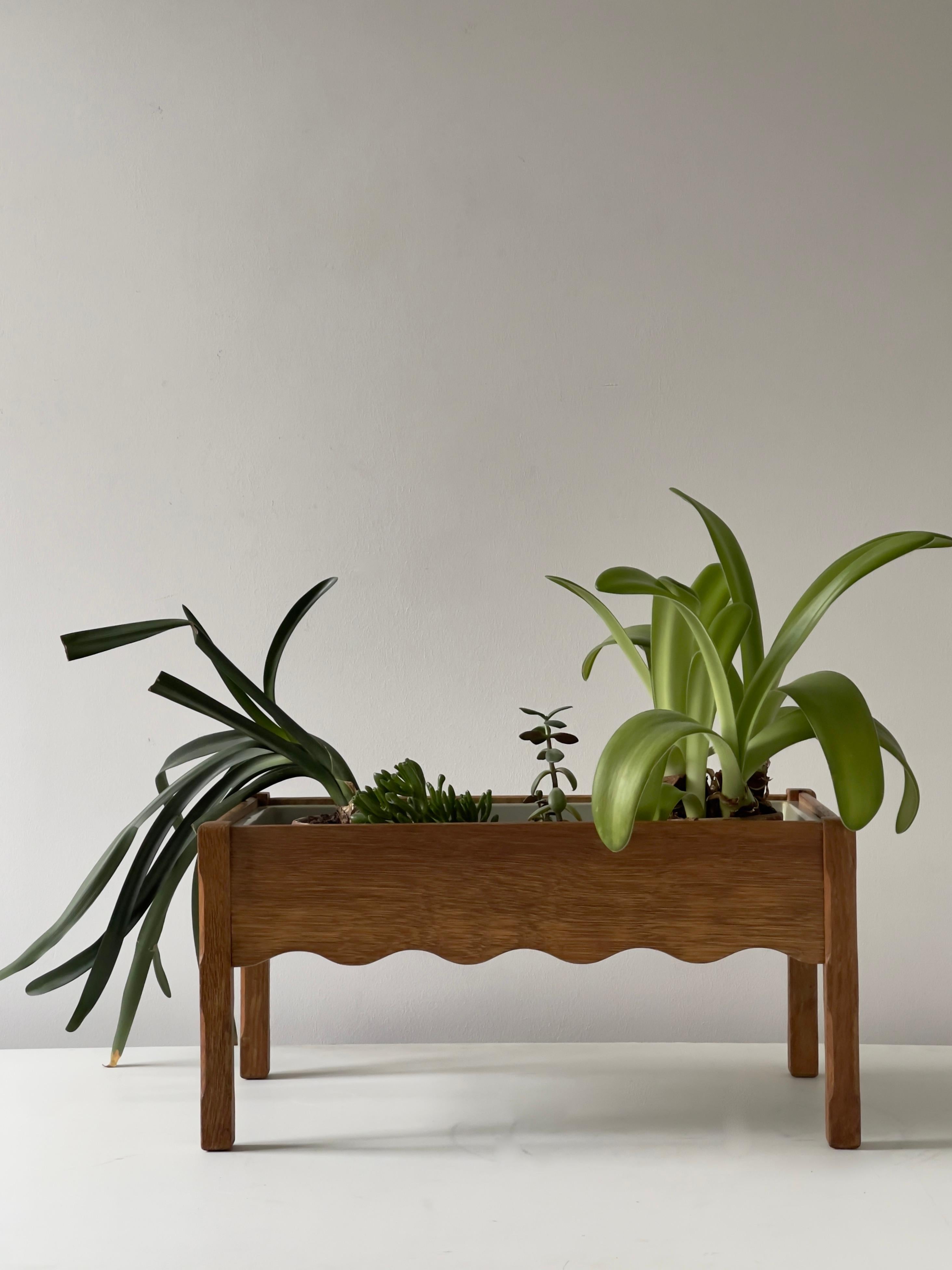 Rare 1970s danish Jardinières ( indoor planting tray ) in solid oak attributed to Henning Kjærnulf designer behind the famous razor chair EG møbler. Very good condition. Consist of a solid oak frame and a removable 10 cm high acrylic tray.