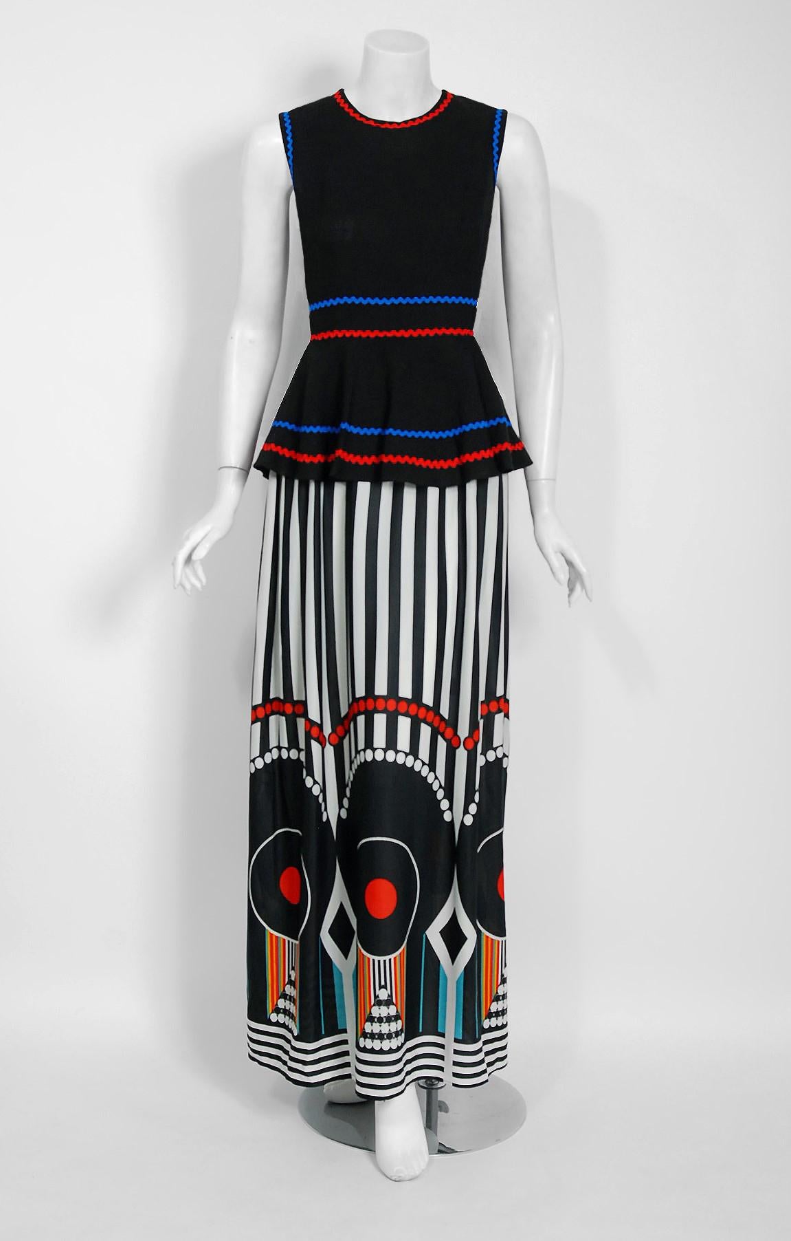 Breathtaking spring-summer 1970 documented black linen and colorful op-art print jersey dress by the famous Jean Varon label. John Bates started the Jean Varon label in 1960 and is possibly one of the greatest forgotten talents of this era. With no