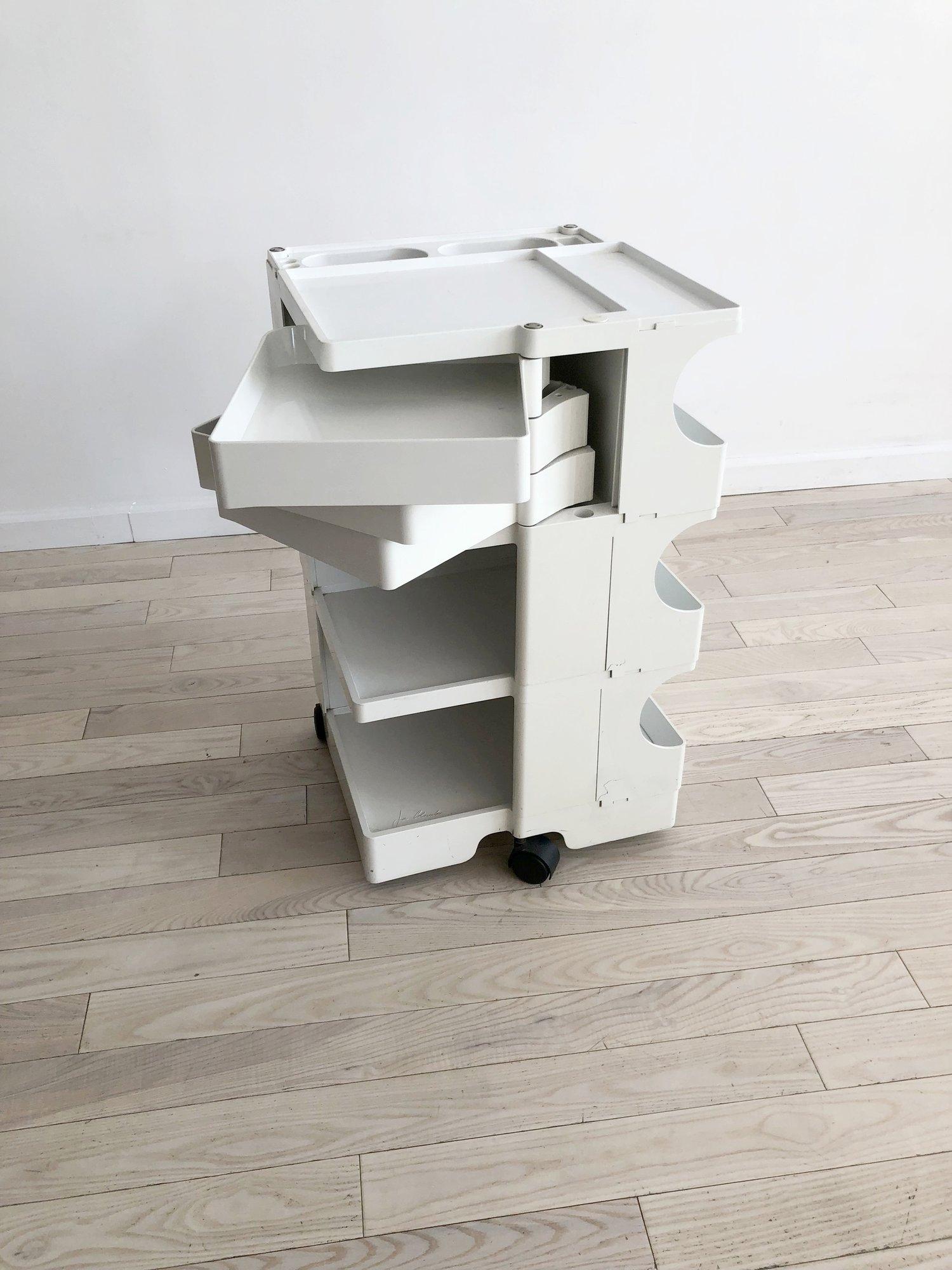 Excellent condition white, signed Joe Colombo Boby Trolley cart. Awesome storage unit in the bathroom, studio, bar cart. It is made out of injections-molded ABS plastic. The white is still white and not yellowed from age. Super clean, very minor