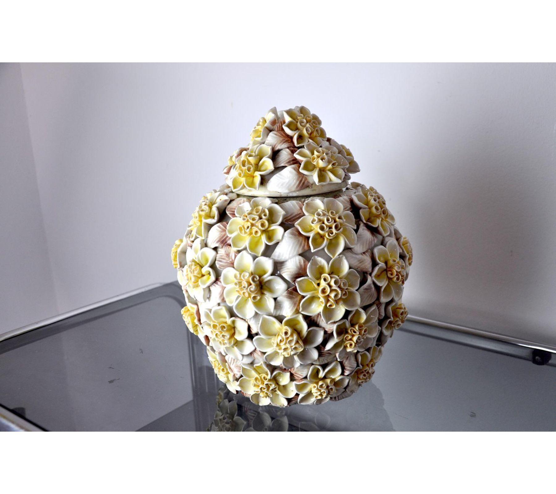 Very beautiful and rare ceramic flower vase from the house manises, valencia, spain, produced and designated in the 1970s. This vase is of a superb manufacture, of a pink and pale yellow color. A unique piece of design that will decorate your