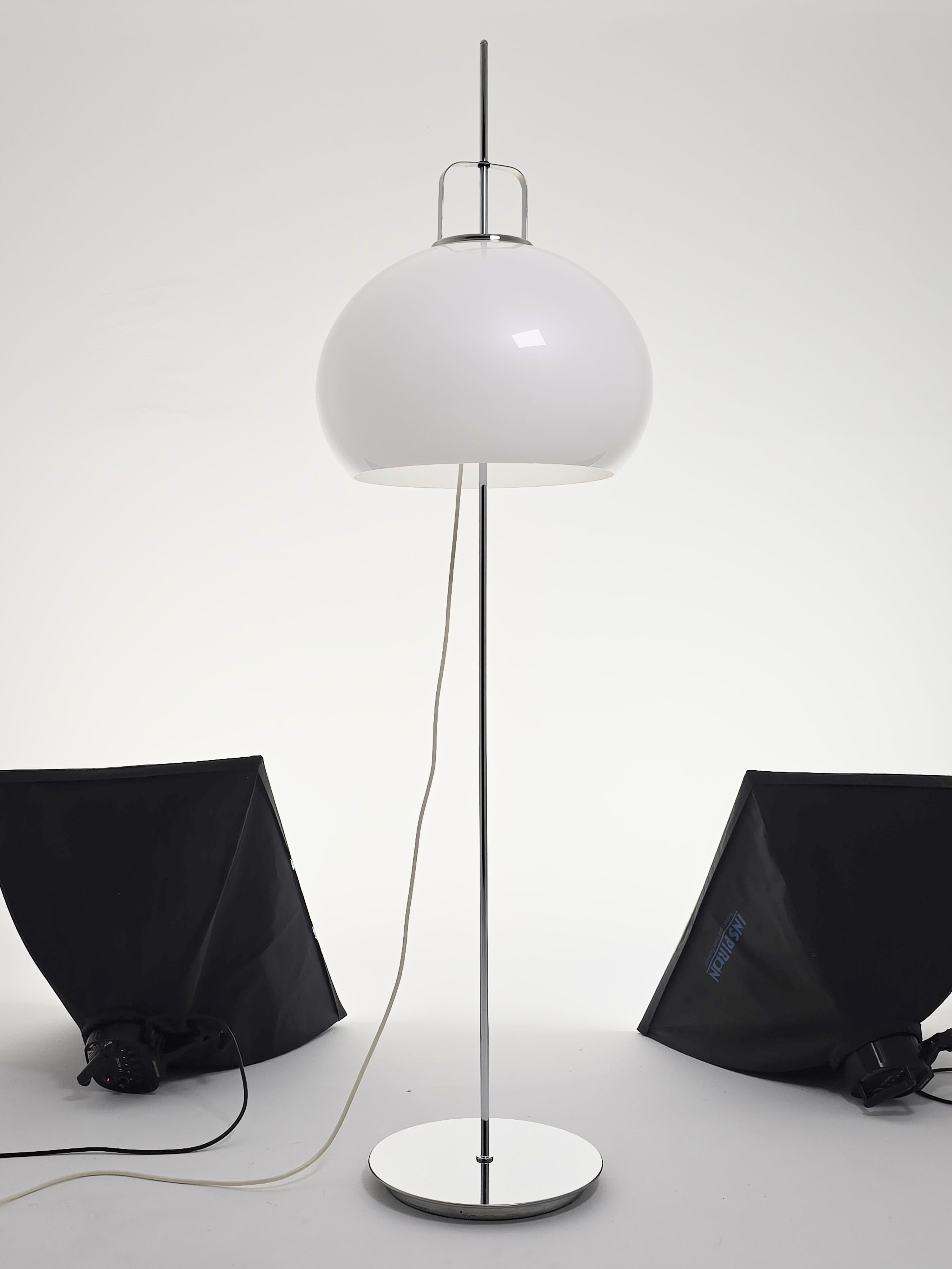 Massive  Guzzini  floor lamp ' Lucerna ' with opale acrylic shade  sliding fully  up and down on pole .

Contain 2 ceramic E26/ E27 socket rated at 60 watt each . 

Foot switch on cord .  

Chrome base measure 13 inches wide . 