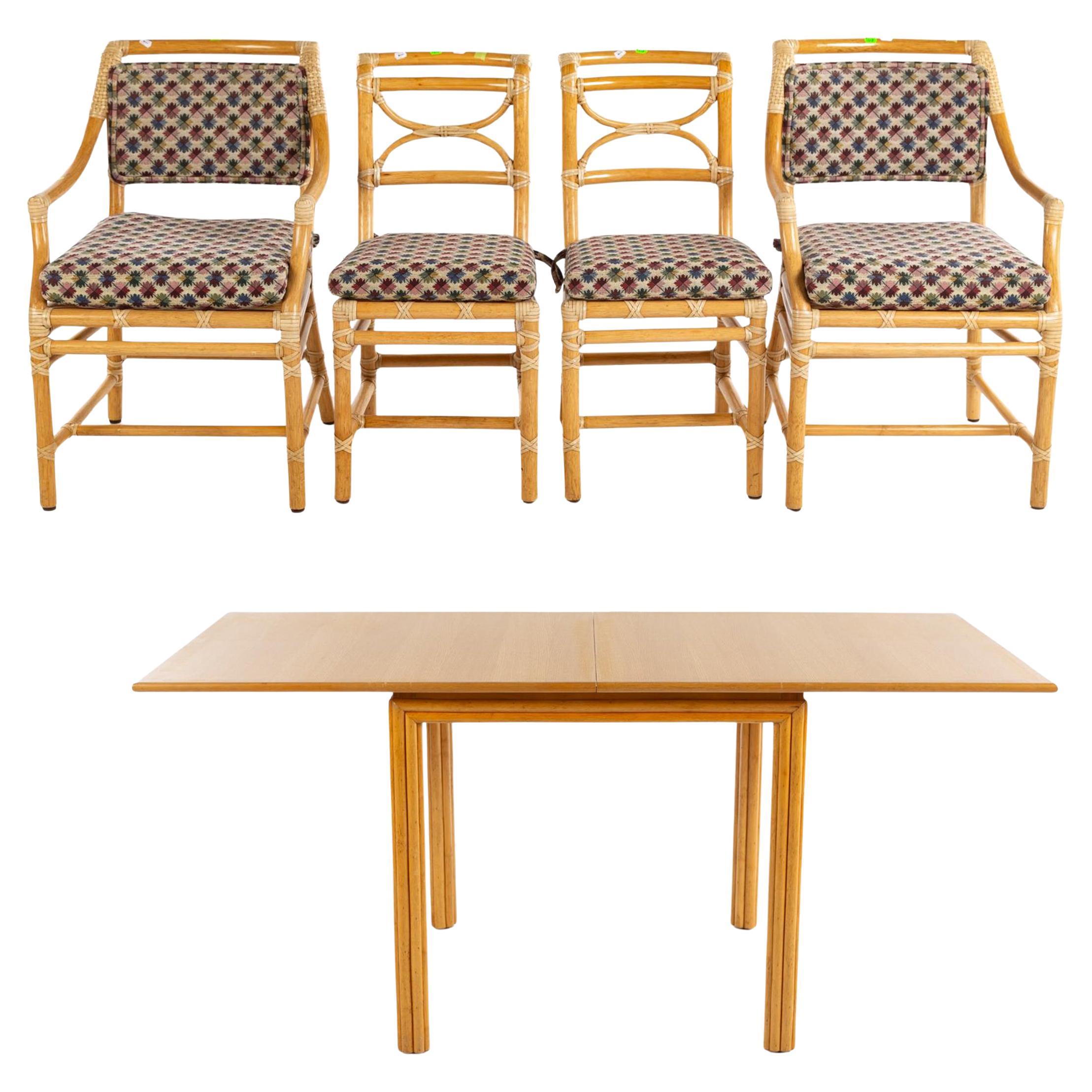 1970 McGuire Rattan Games Tavolo da pranzo allungabile con piano ribaltabile e quattro sedie da pranzo in vendita