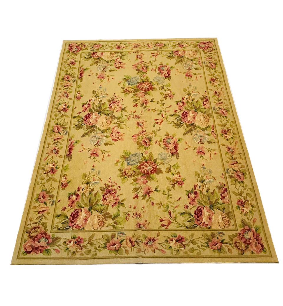 Wonderful hand embroidered carpet in petit point with warm colors.
Luxury rug with color flowers. This is a Chinese carpet, knotted by hand with wool, made in the 1970s. Preserved in perfect condition. Multicolored in red, olive green and