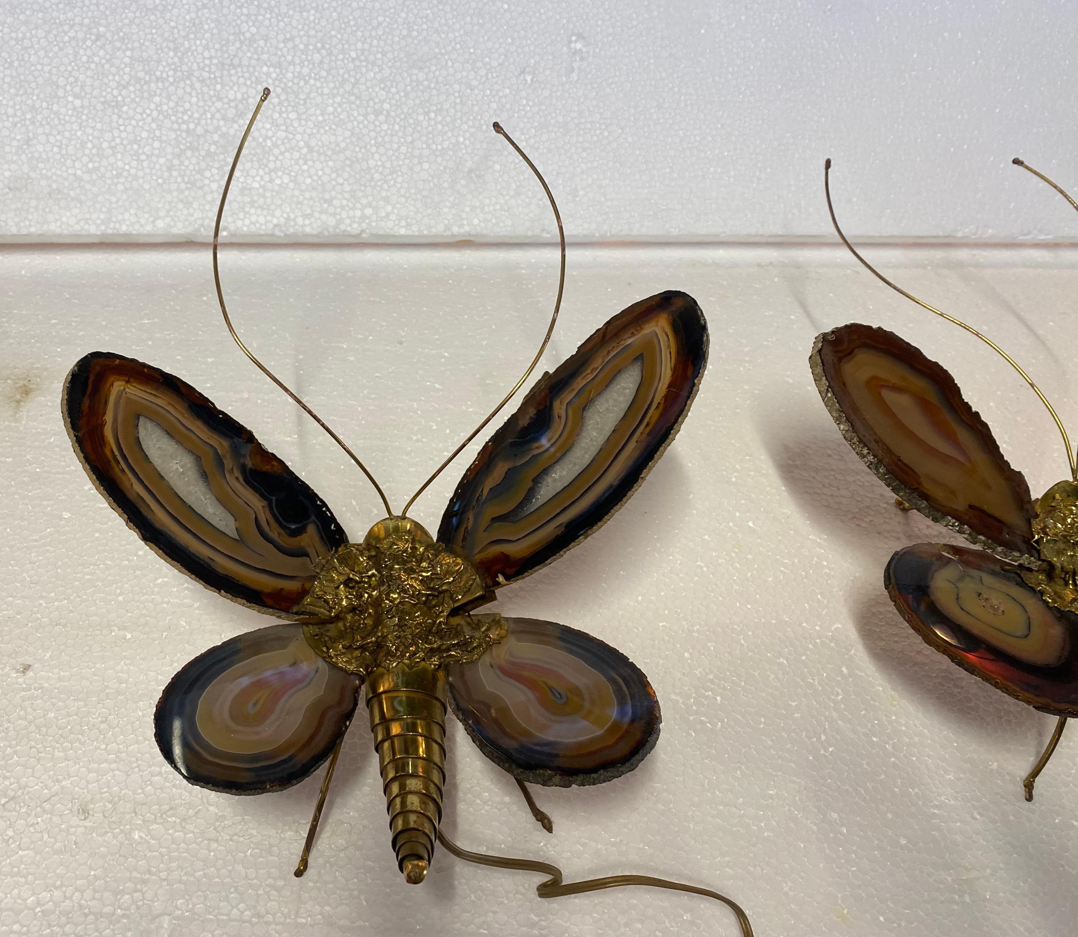 Pair of butterfly wall lights in bronze or brass, 1 bulb, agate wings, good condition, circa 1970
Wing height: 20 cm
Width: 33 cm
Height: 40 cm
Depth: 13 cm