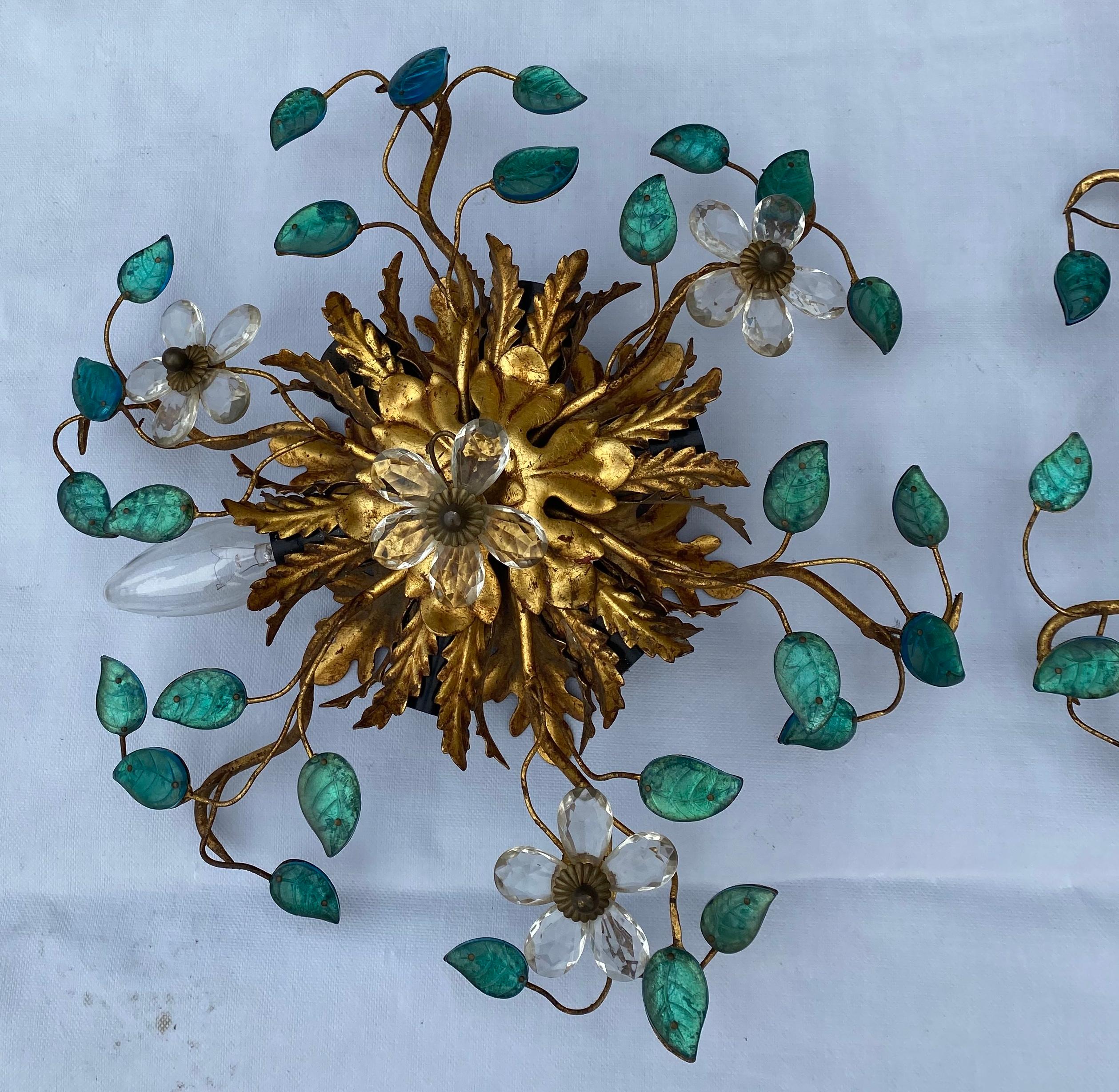 Pair Ceiling or wall lights in gilded metal, 6 bulbs. Adorned with blue-green colored leaves and glass or crystal flowers
Good condition, Circa 1970

Measures: Height: 20cm
Diameter: 40cm
