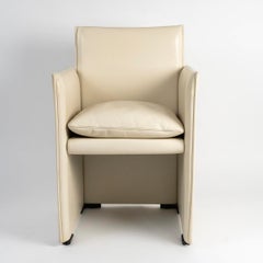 1970: Coppia di poltrone Break in pelle color crema di Mario Bellini, edizione Cassina