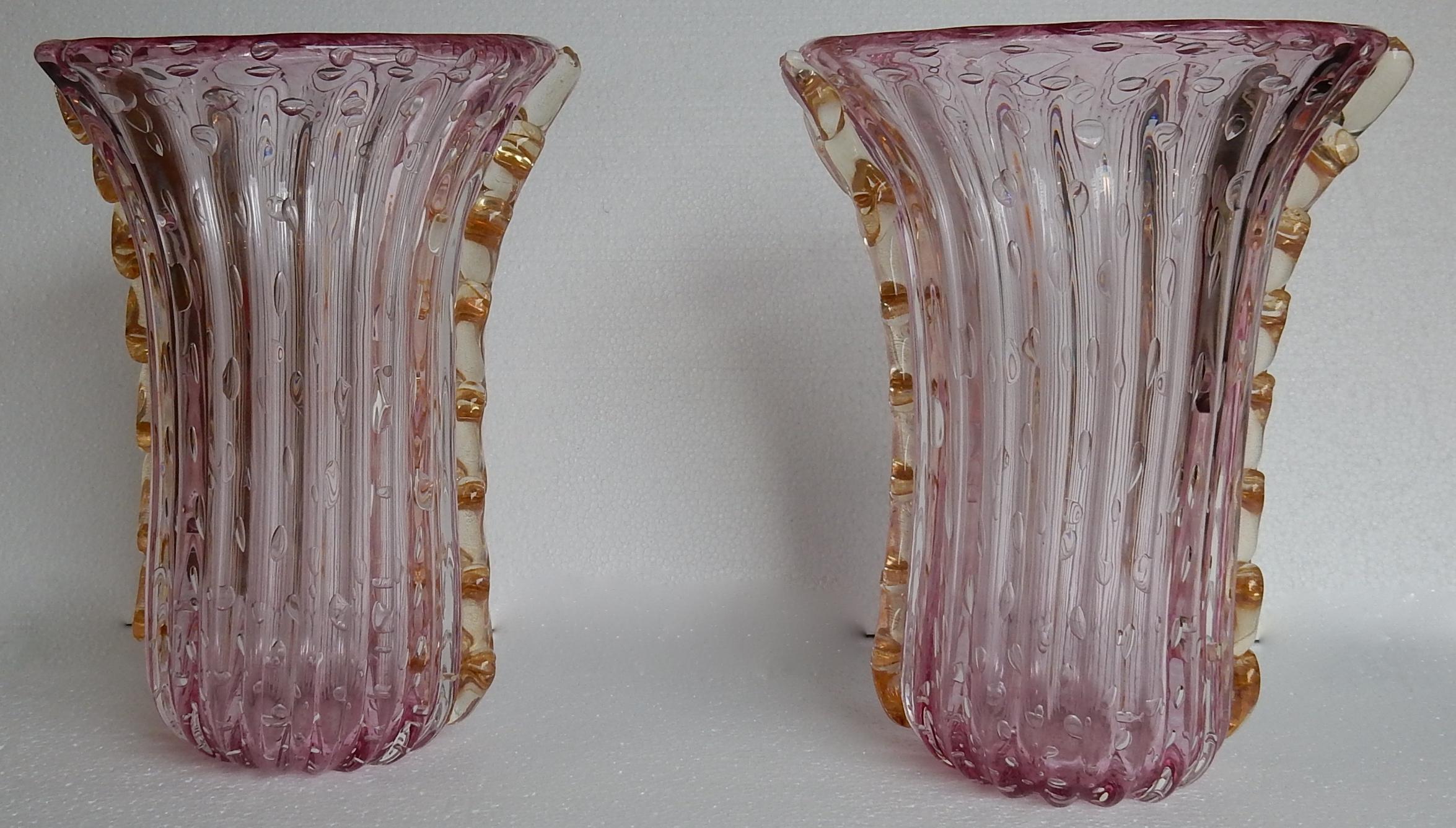 Pair of Murano vases or similar with bubbles and gold inclusions, good condition, pink crystal and gold, signed Toso.
circa 1970
They have a small difference in size

Length 26 cm
Width 28 cm
Height 34 cm
Length 24 cm
Width 27 cm
Height 34