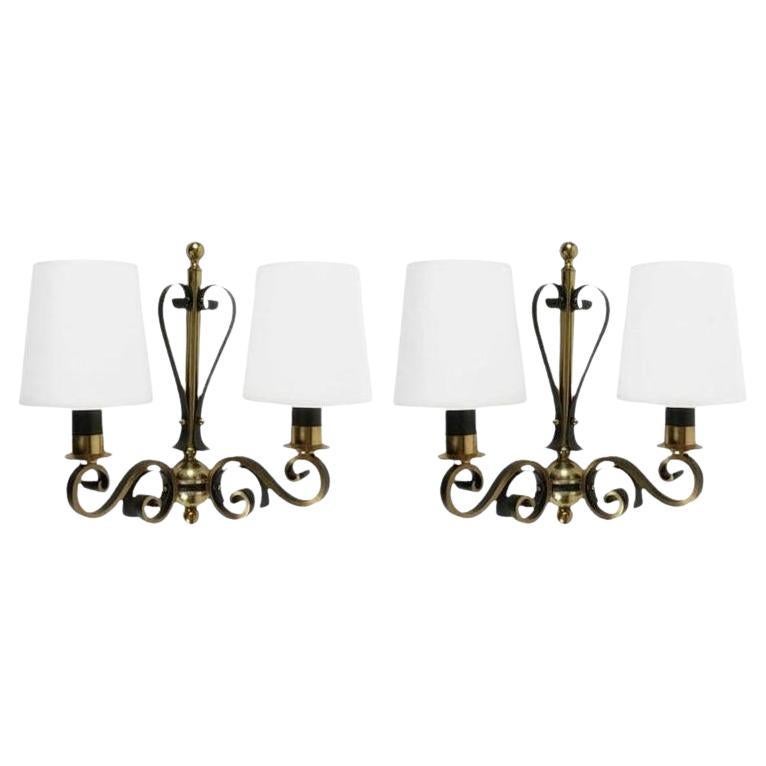 1970 Coppia di lampade da parete in ferro battuto e ottone Maison Roche