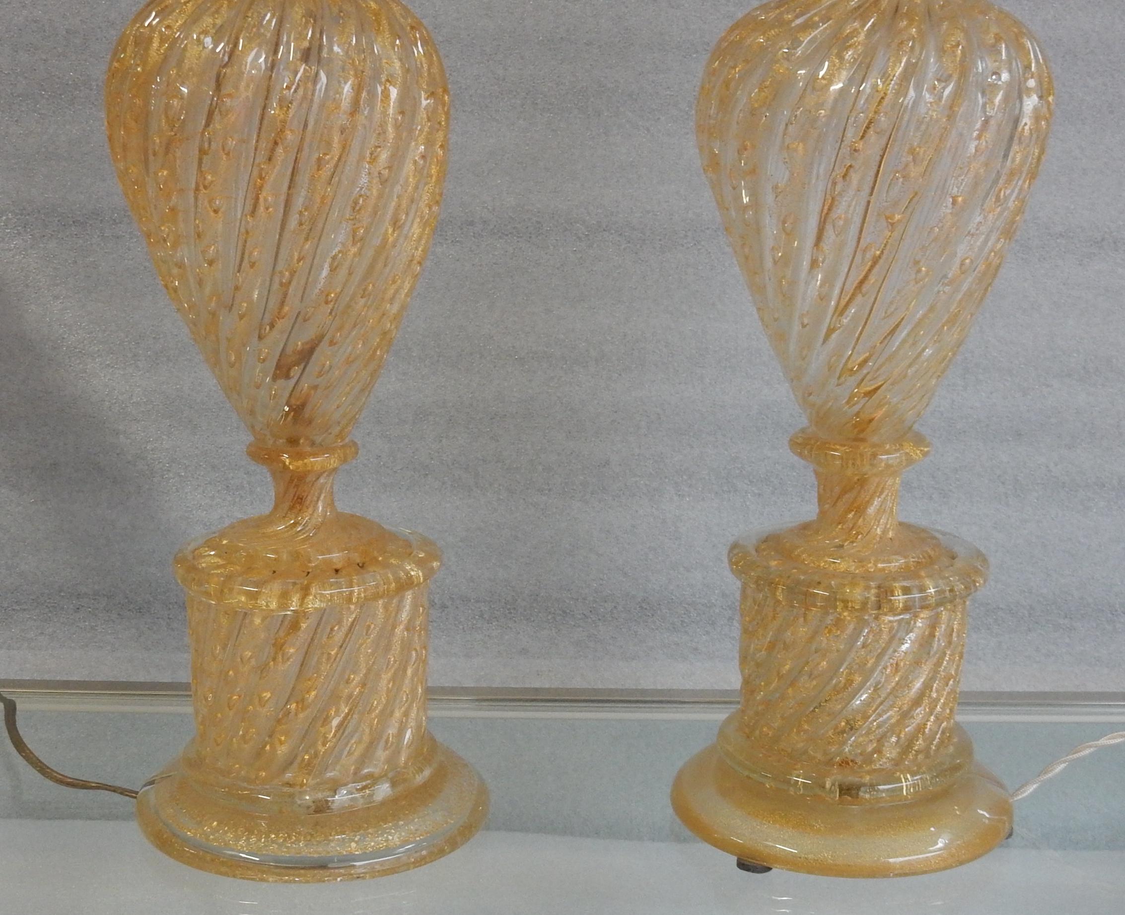 Pair of lamps or similar in Murano glass with gold spangles, one bulb, circa 1970, conical barrel, Good condition
Height of the glassware 43 cm without socket

Base diameter 16 cm
Diameter 15 cm.