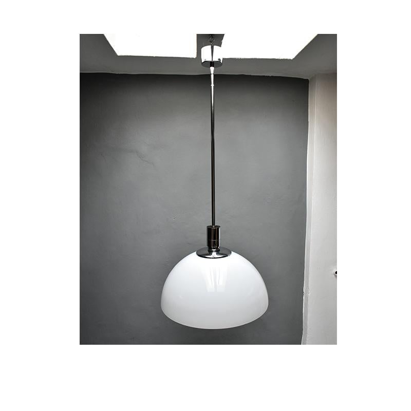 Pendant chandelier design by Franco Albini Franca Helg 
The pendant chandelier belong to the series Am /As by Sirrah, it was 
produced in Italy towards the end of the 1960s
The pendant chandelier has opal glass diffuser support in chromed