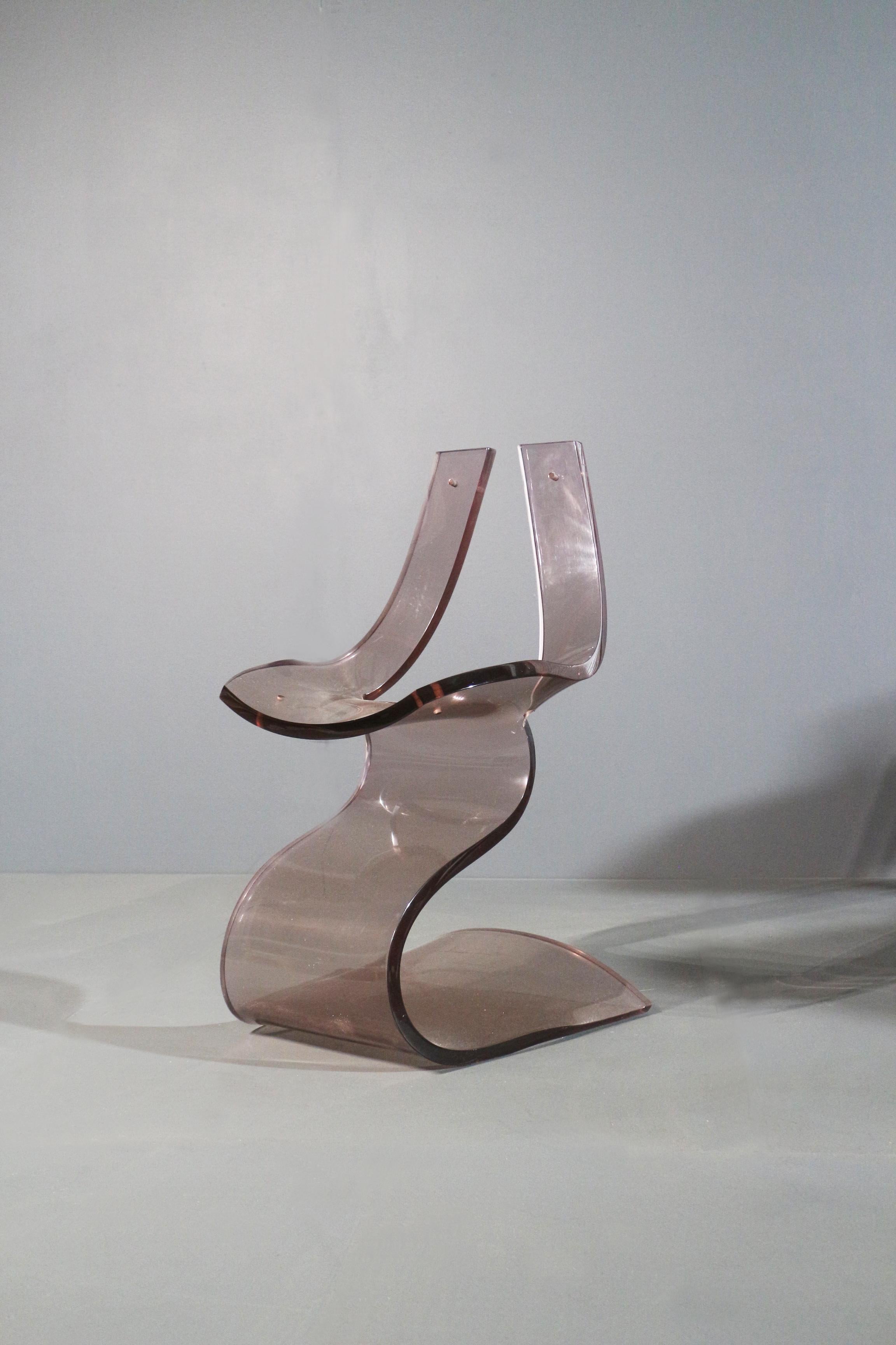 Very rare sculptural chair by Michel Dumas from 1970s. 
Brow plexiglass. In very good conditions.