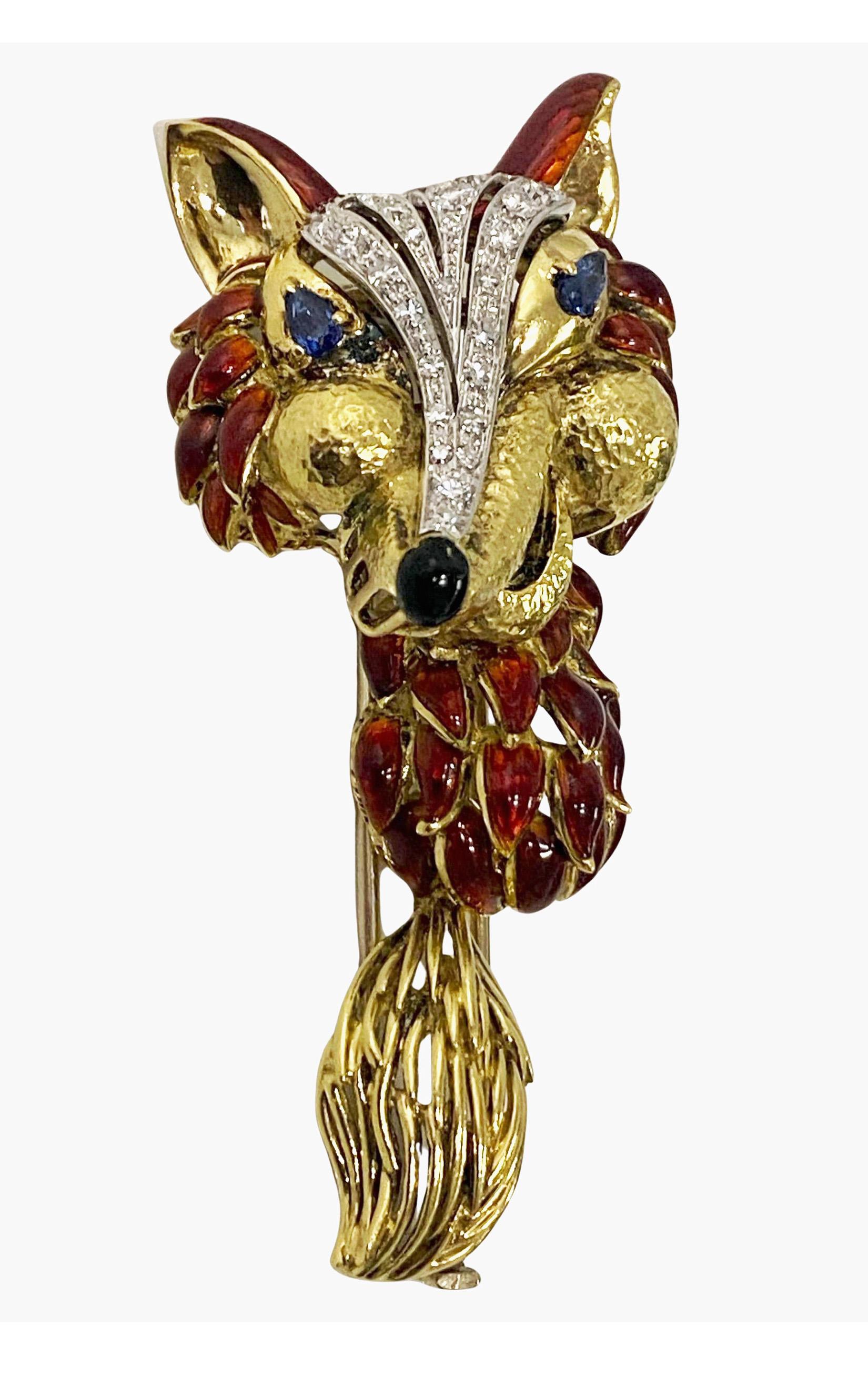 1970’ s Fox brooch Spritzer & Fuhrmann, 18K with diamonds, sapphires and enamel. 18kt yellow gold mount with white gold double clip. American Circa 1970. 2 pear shaped blue sapphires measuring approximately 4.2 x 2.25 x 1.8mm deep estimated to weigh