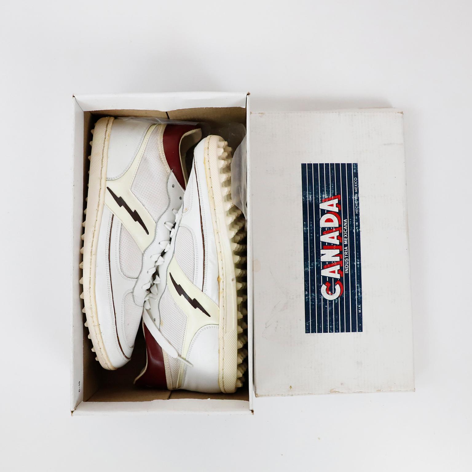 circa 1970. We offer this unique pair of never used CANADA sneakers with original box.
About CANADA:
CANADA was a very successful Mexican shoes and sneakers brand, during the 70s and 80s.
In the book Shoe Dog, in which Phil Knight, the legendary