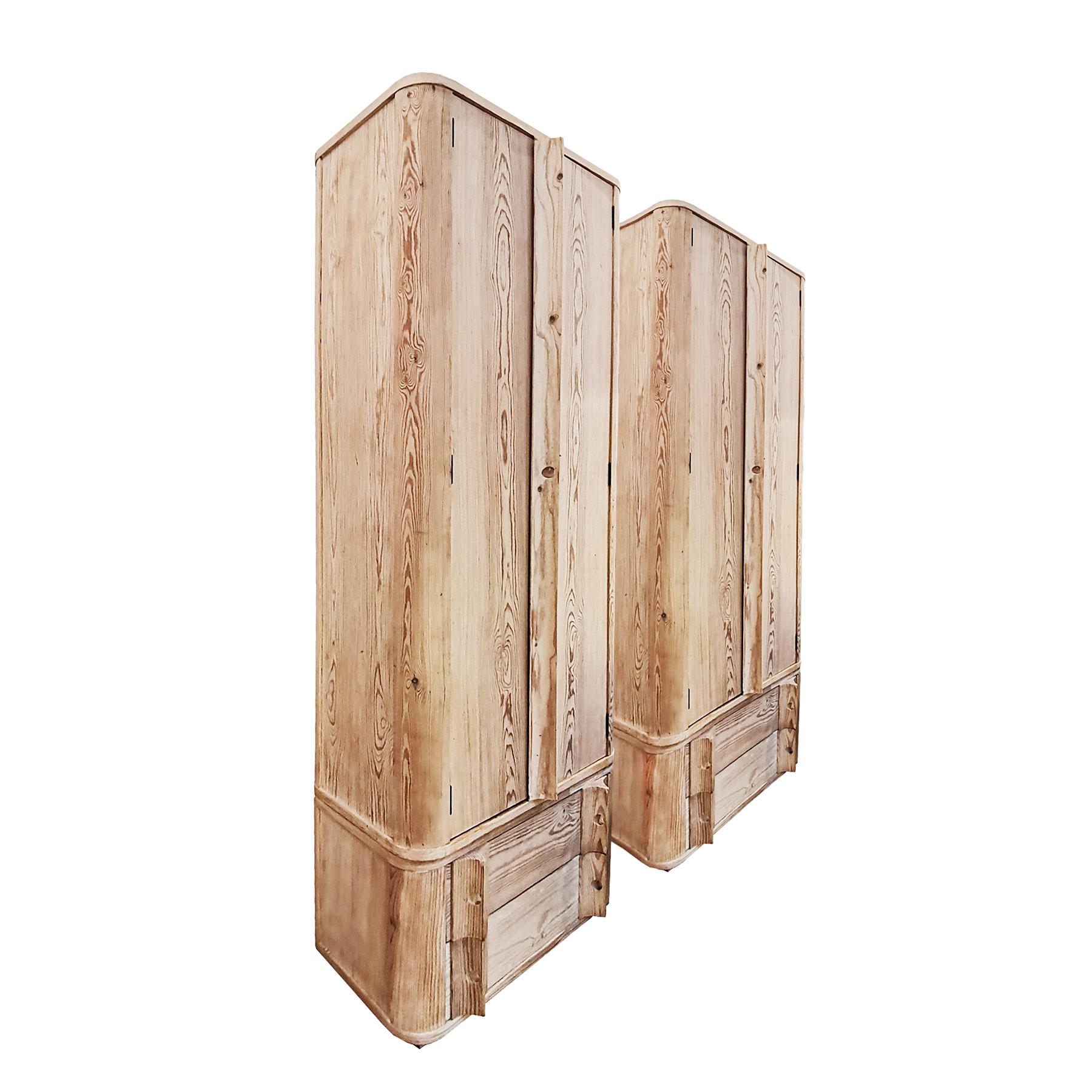 Pair of modular wardrobes in white pitch pine wood, one base block with two drawers (could be put on top) and one main block with two doors with shelf and a hanging bar.
Design: Jordi Vilanova
Spain, Barcelona, circa 1970

Measures: Base block