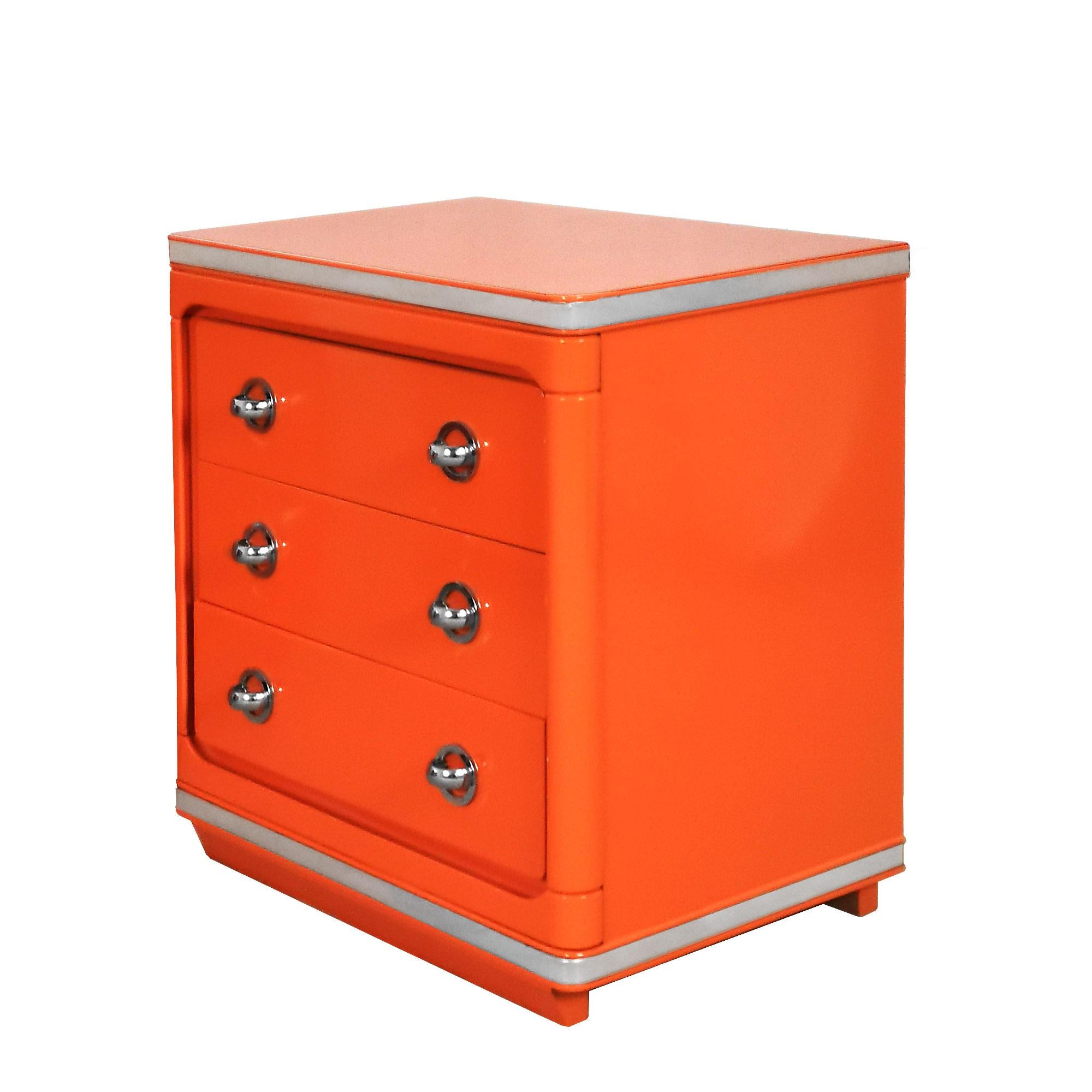 Pair of night stands, orange lacquered solid wood, three drawers, chrome plated metal handles and decorations.

Spain, Barcelona c. 1970.