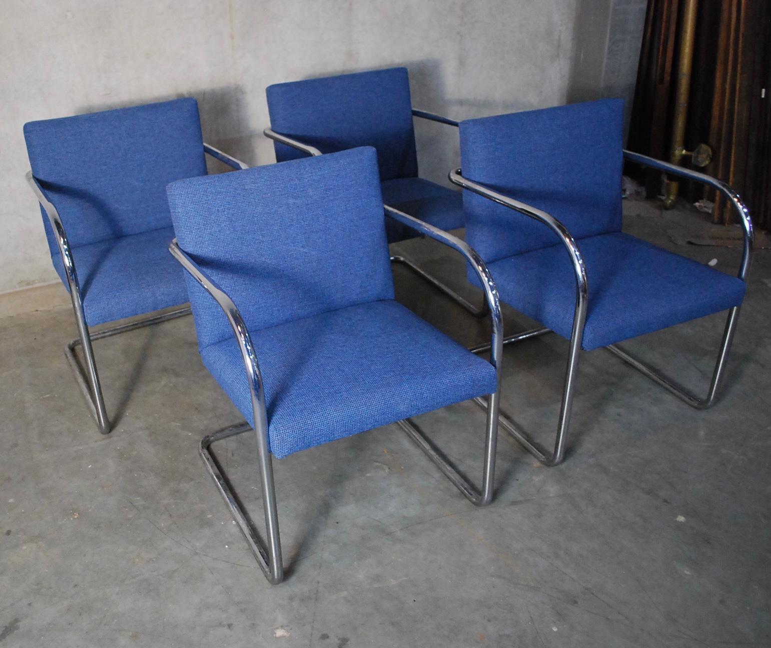 Classic Bauhaus design pair of Brno chairs by Mies Van der Rohe for Thonet.
The chairs feature polished chrome-plated tubular steel cantilevered frames, seats upholstered in a dark blue weave.
Original labels.
Salvaged in Seattle.